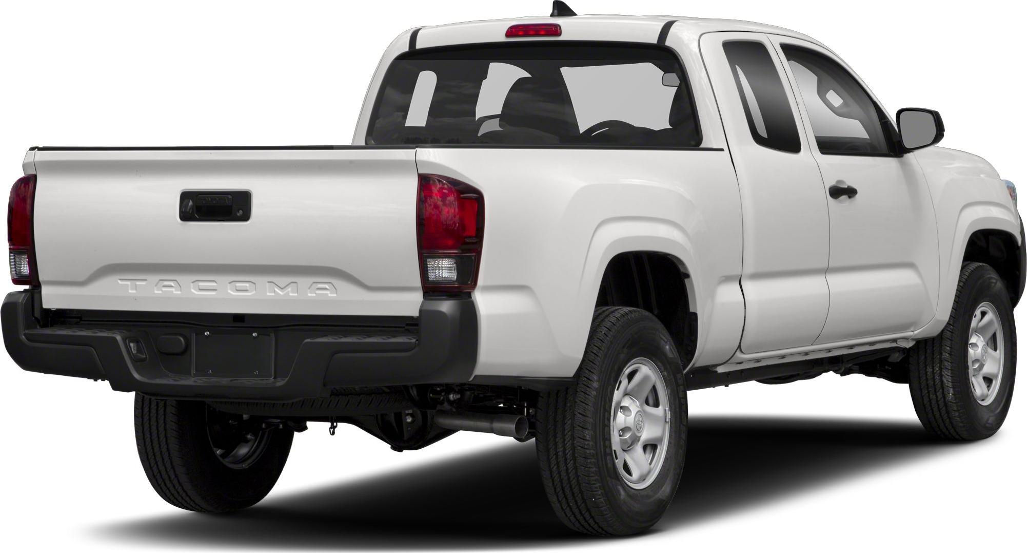 Rear view of mid-size pickup with access cab and embossed tailgate