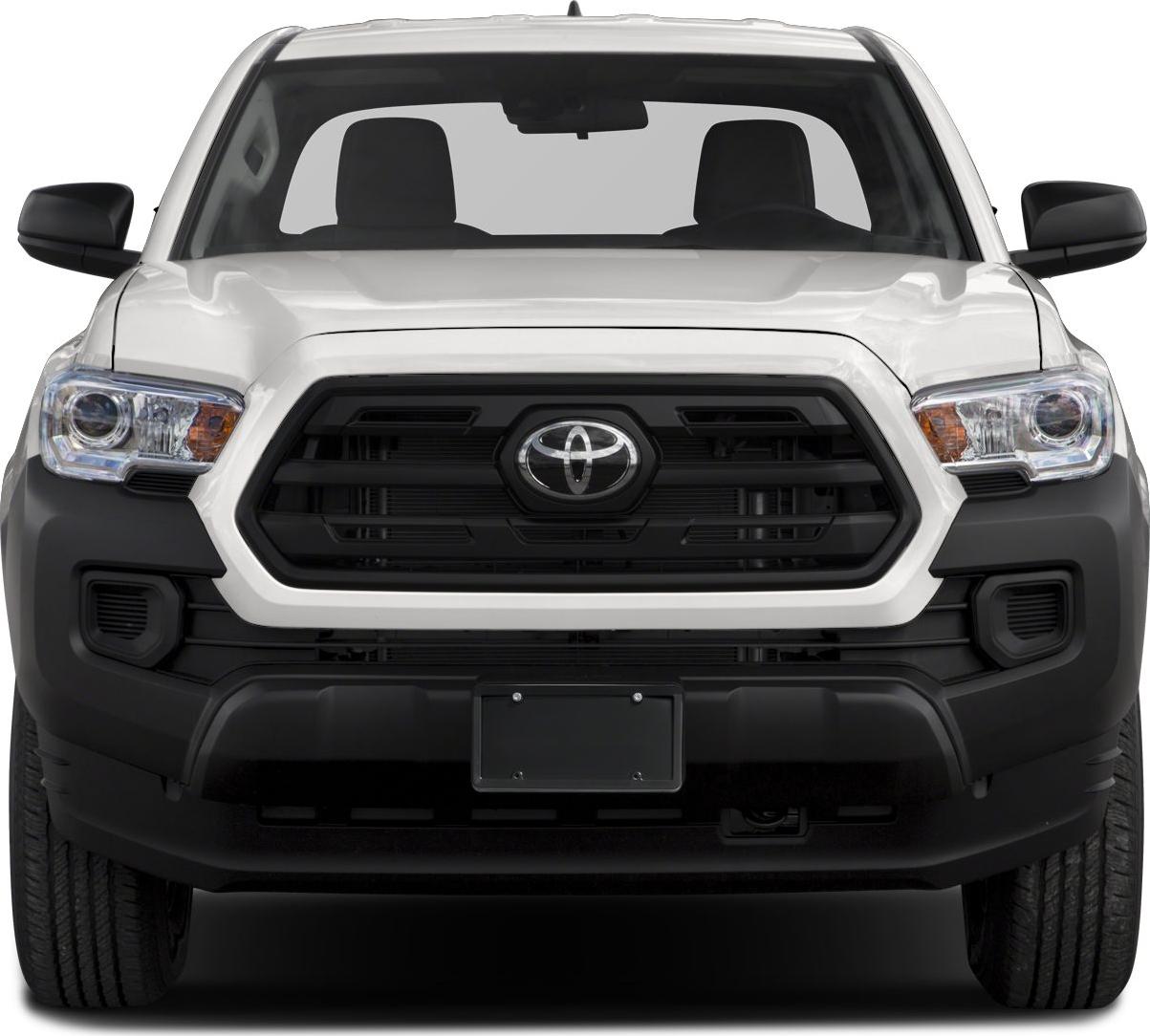 Front view with prominent black grille and headlights