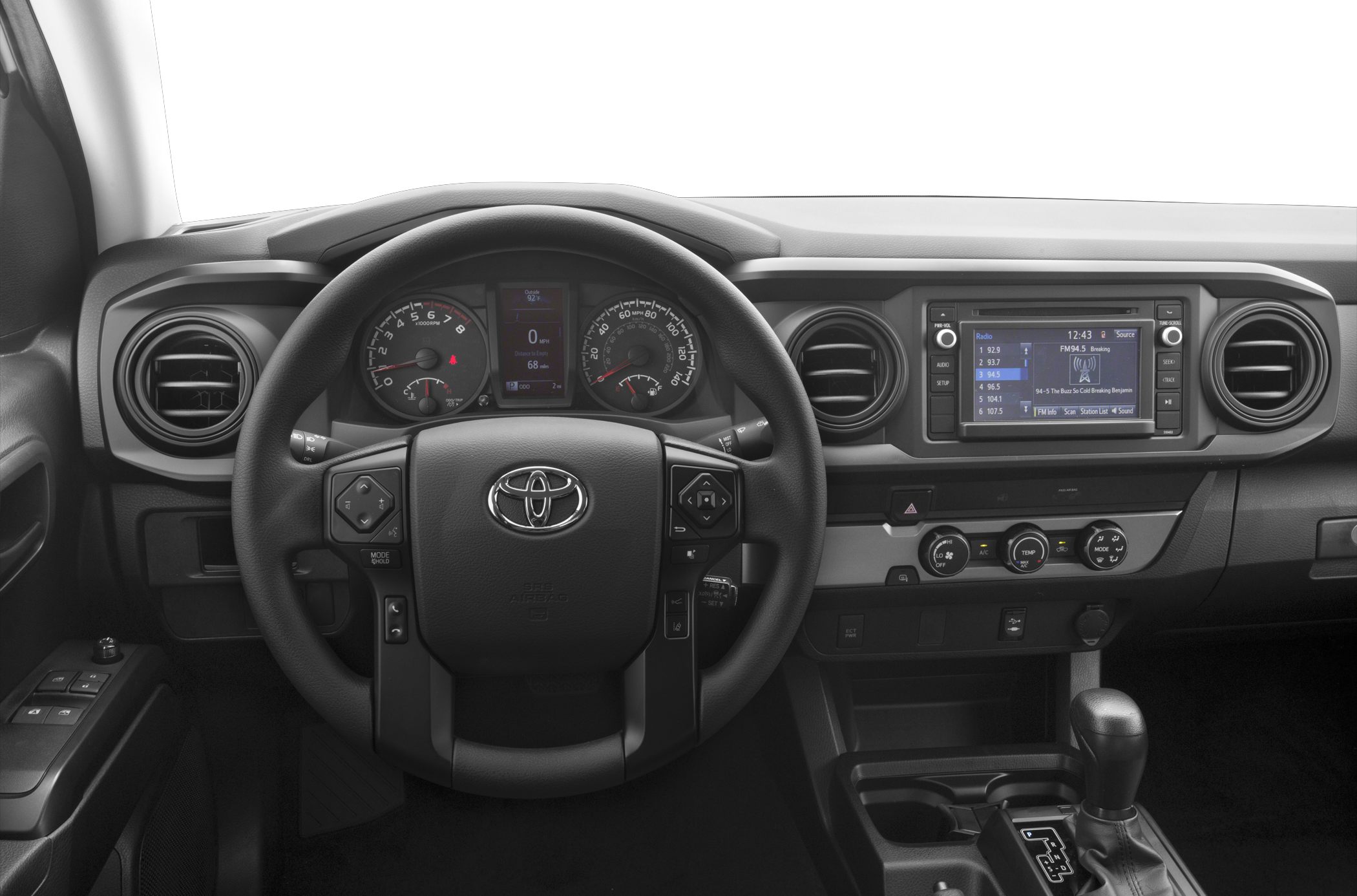 Steering wheel, dashboard with gauges and infotainment system