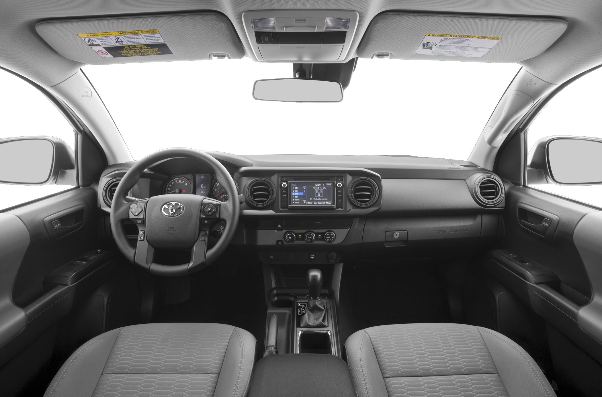 Dashboard and control layout with steering, infotainment, and gear shift