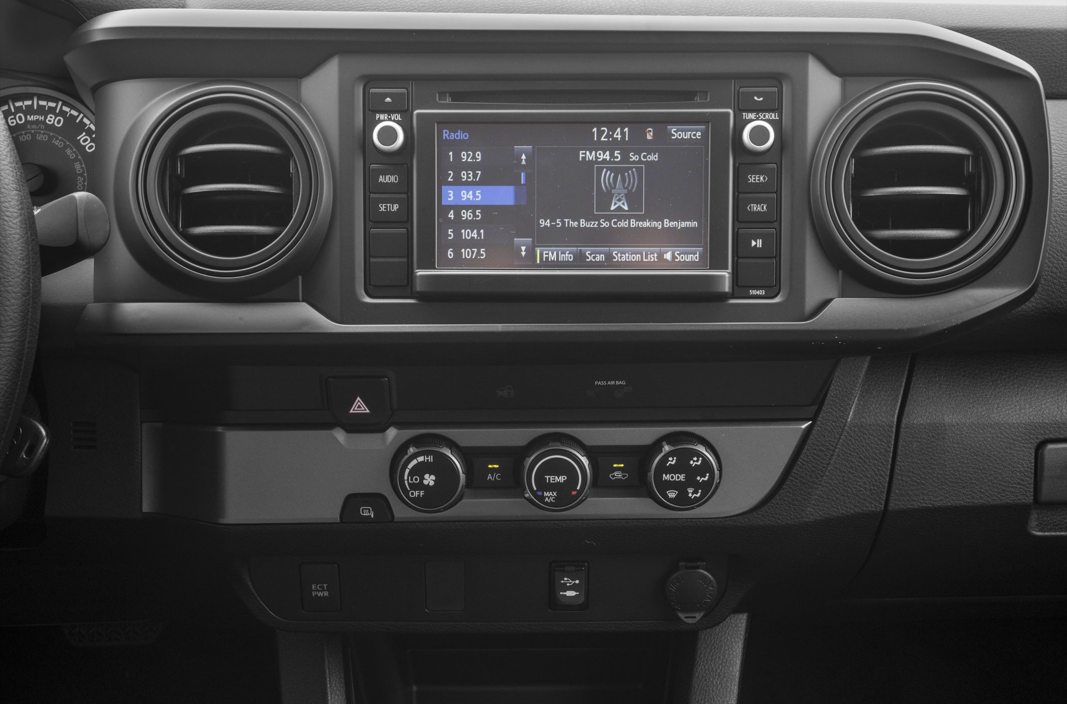 Dashboard with infotainment system and climate control knobs