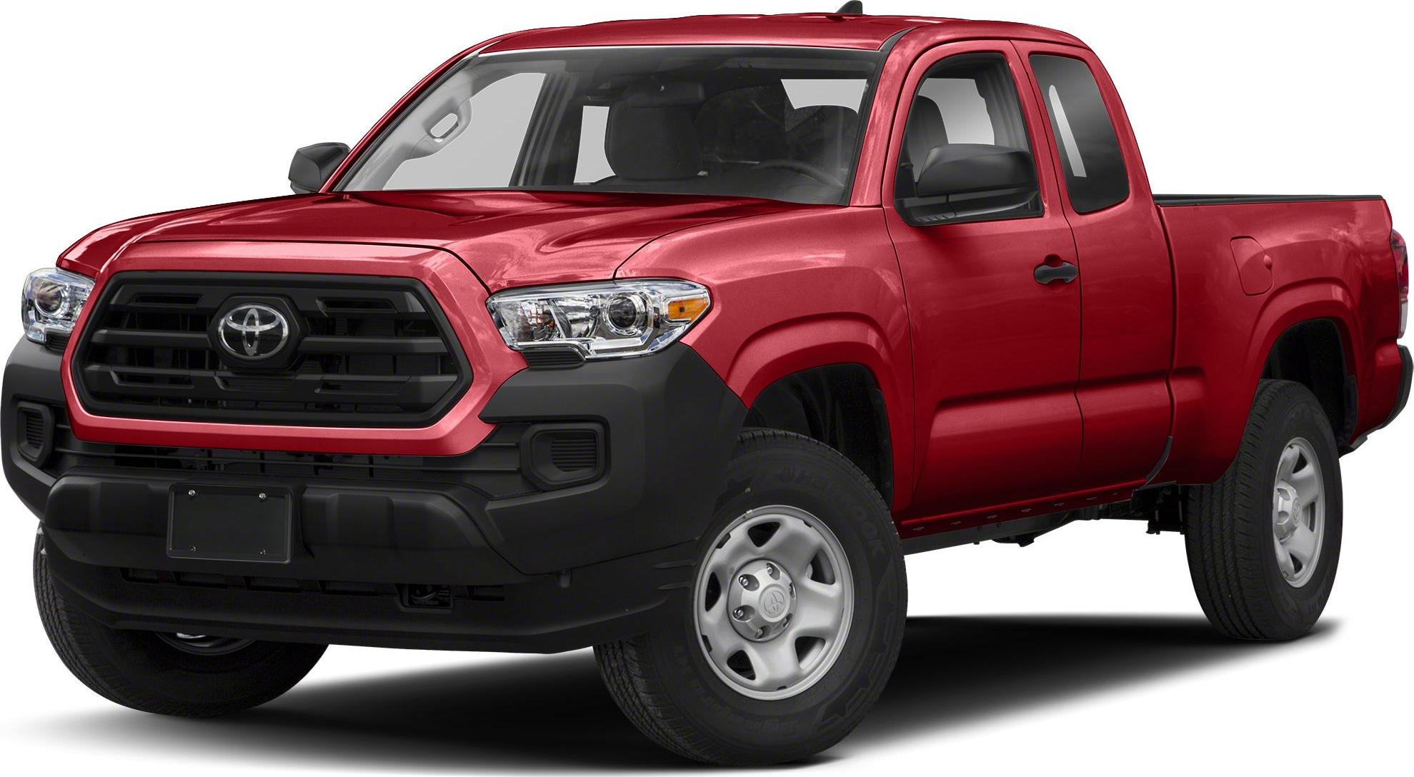 Front-side view showcasing grille, headlights, and cab of pickup truck