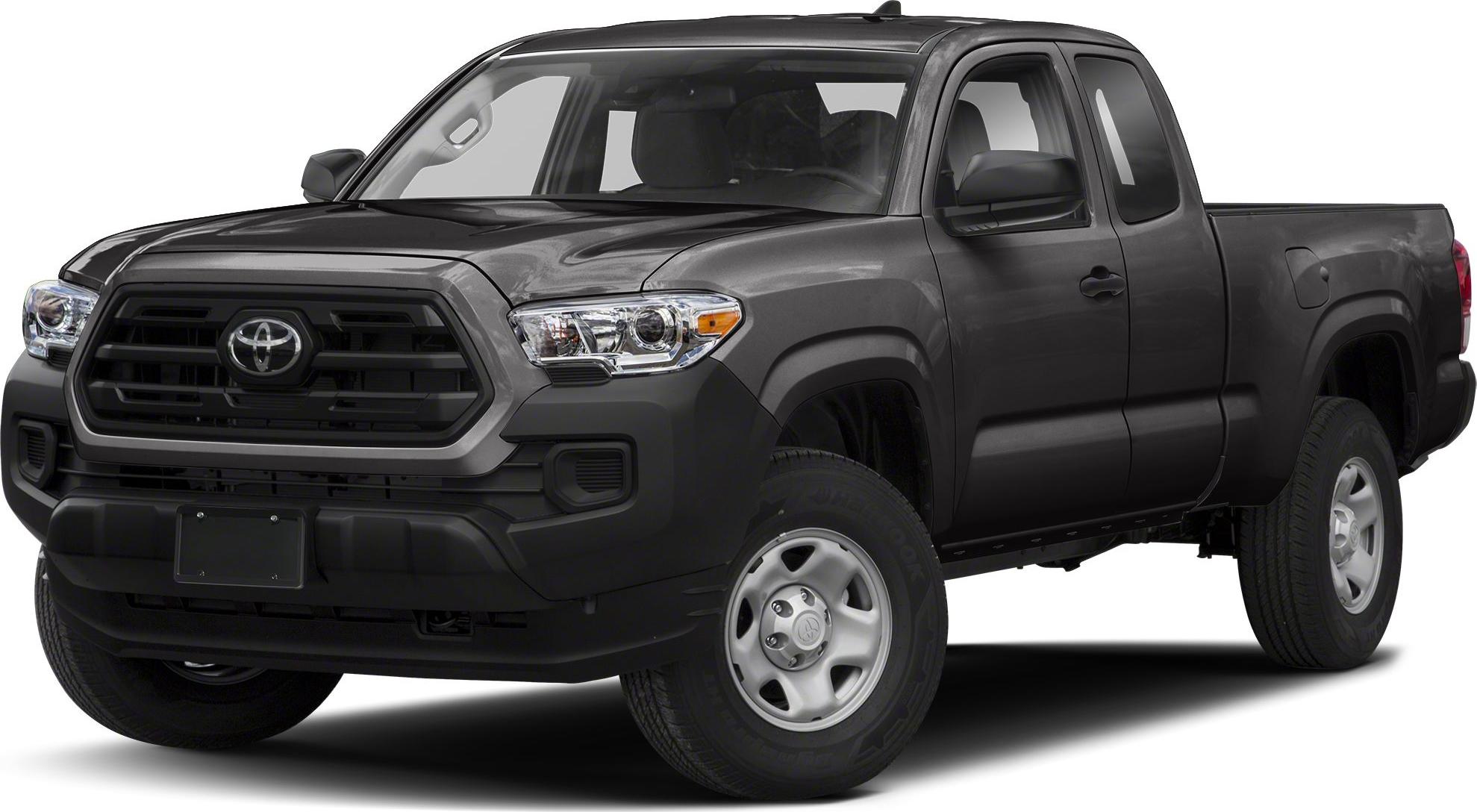 Front-side view of black extended cab pickup with bold grille