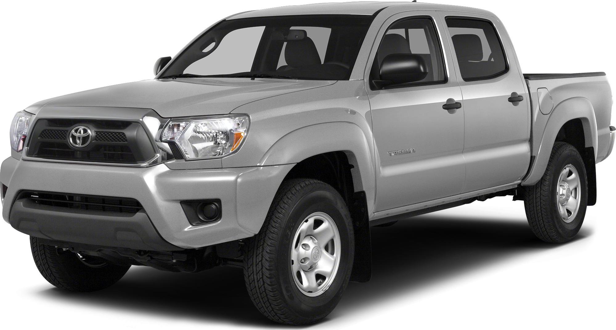 Silver double cab pickup truck with chrome grille and headlights