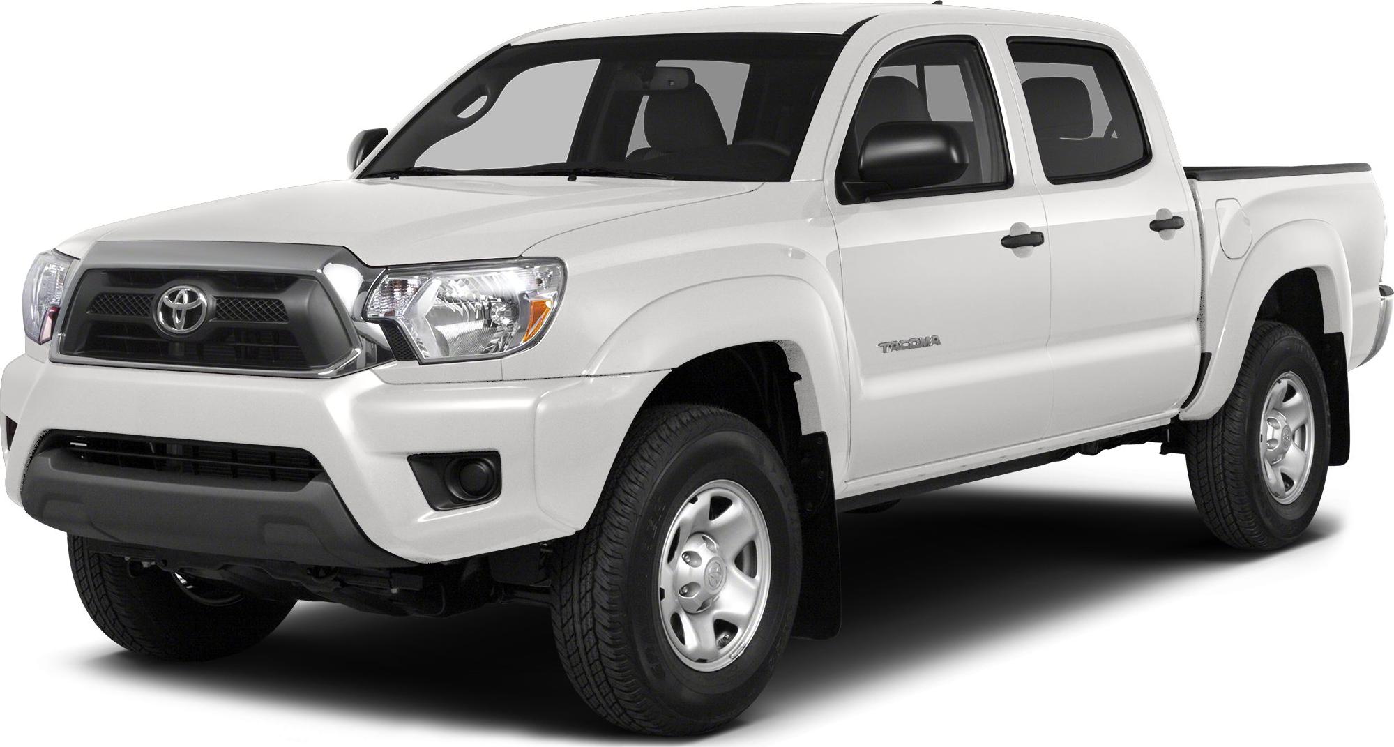 White double cab pickup truck front-side view with bold grille and clean lines