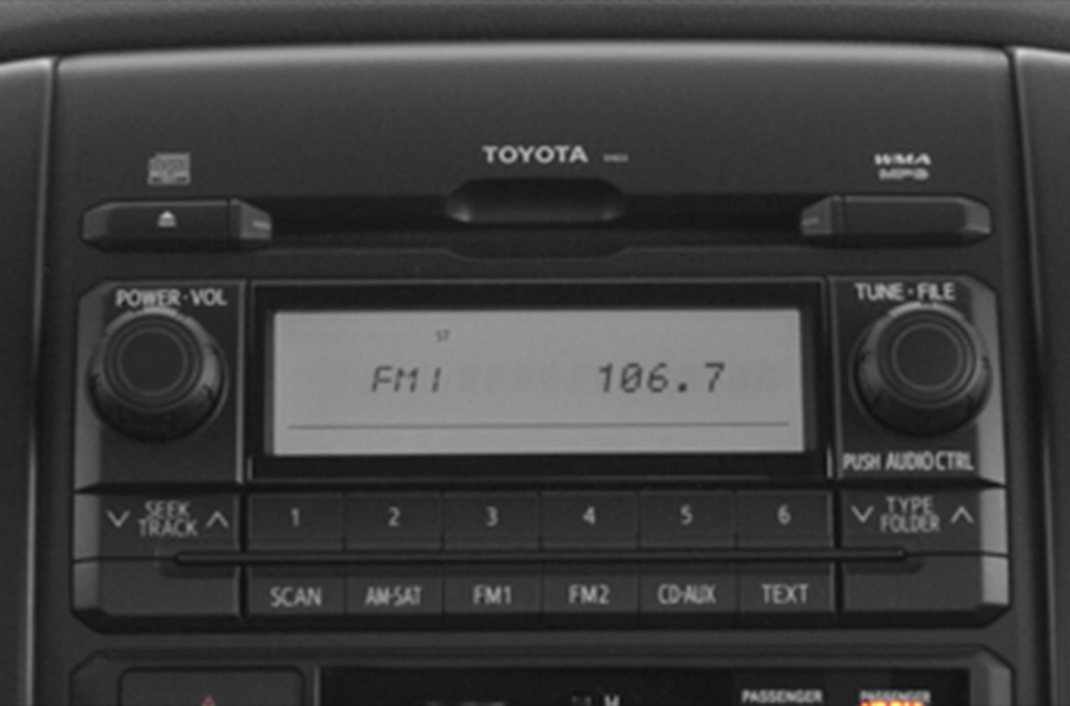 Car audio system with radio, volume, and tuning controls