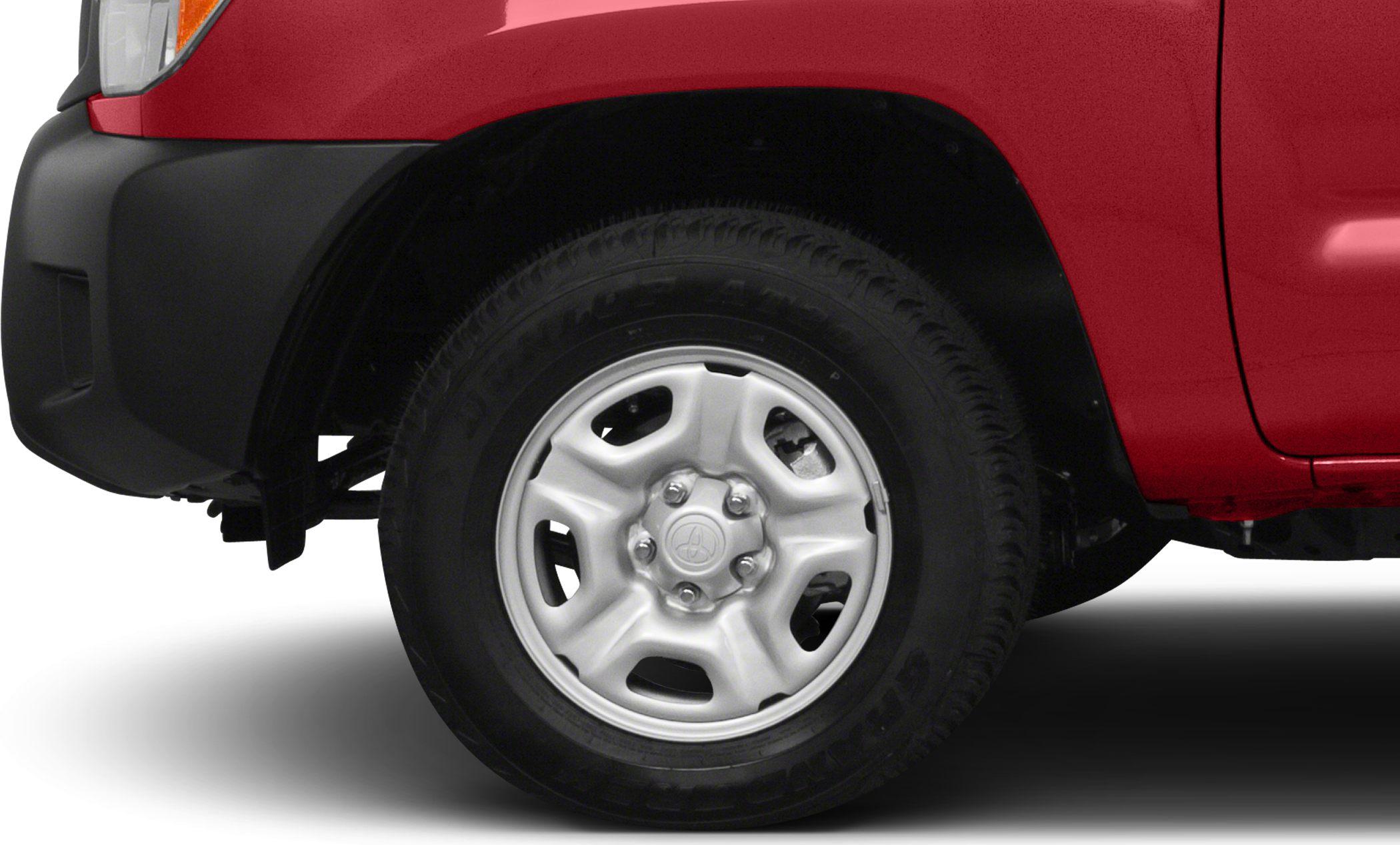 Close-up of alloy wheel and black front fender