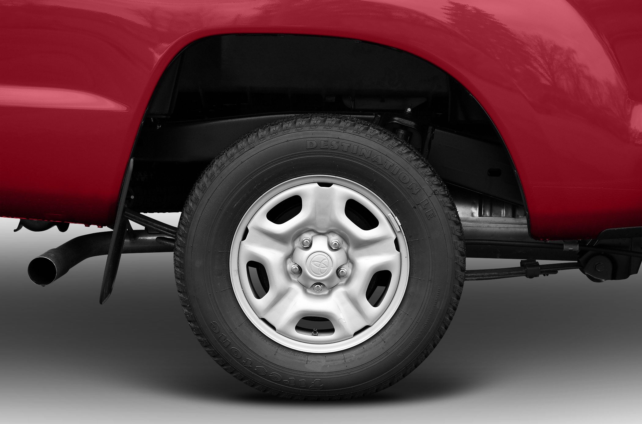 Close-up of wheel with Firestone Destination LE tire and alloy rim