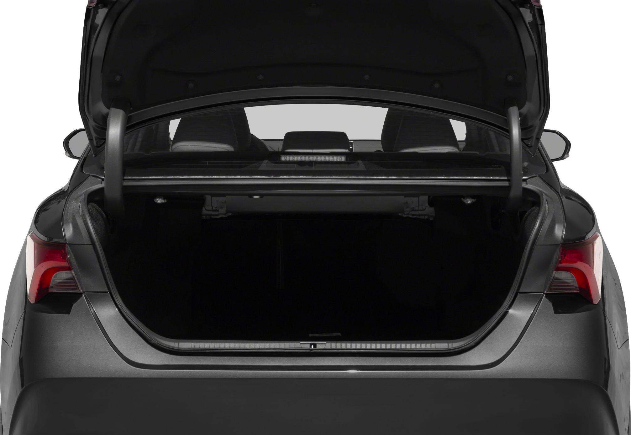 Open rear trunk space of a modern sedan with visible taillights