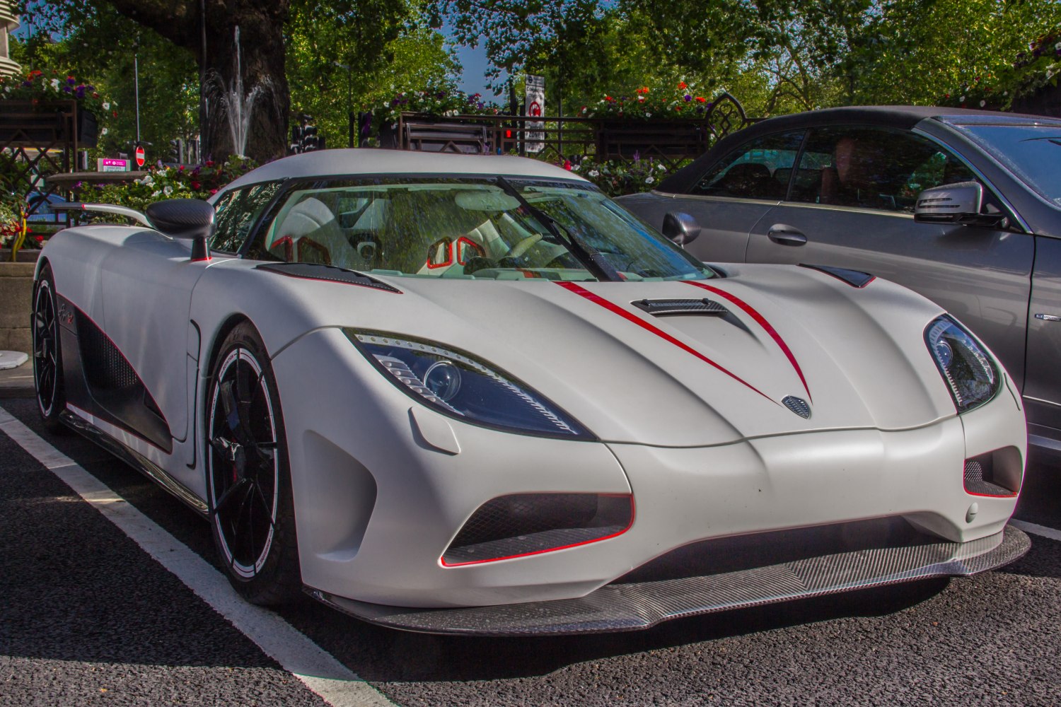 Front view of a 2011 sports car with aerodynamic body and carbon fiber details