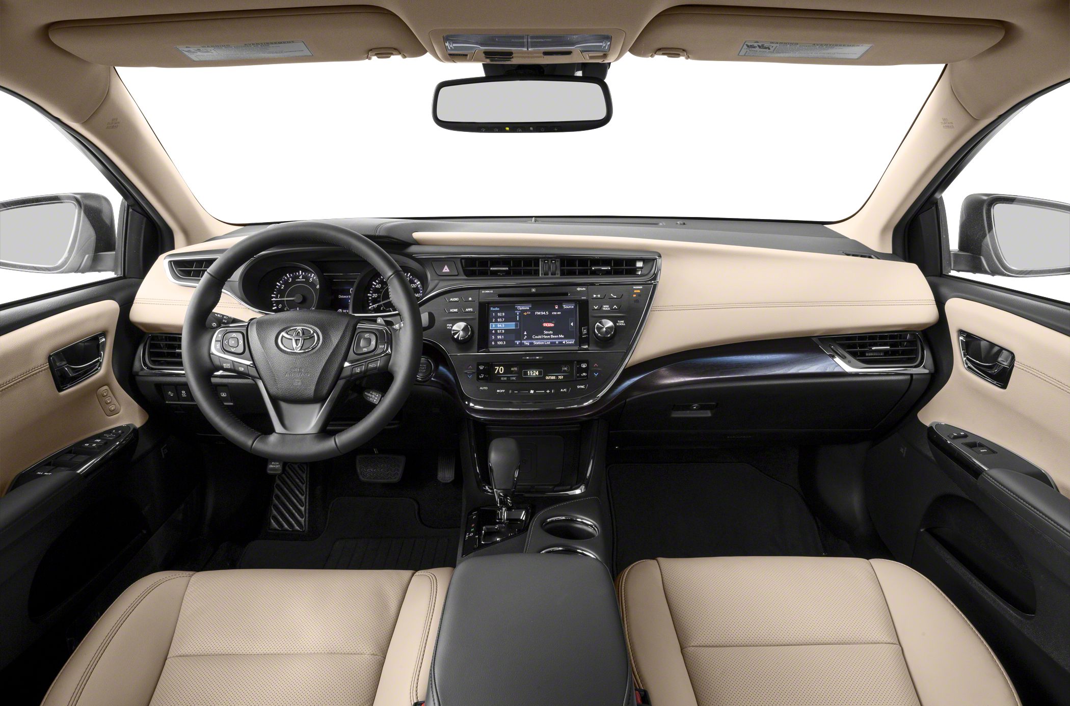 Beige leather seats, advanced dashboard, steering wheel controls, infotainment display.