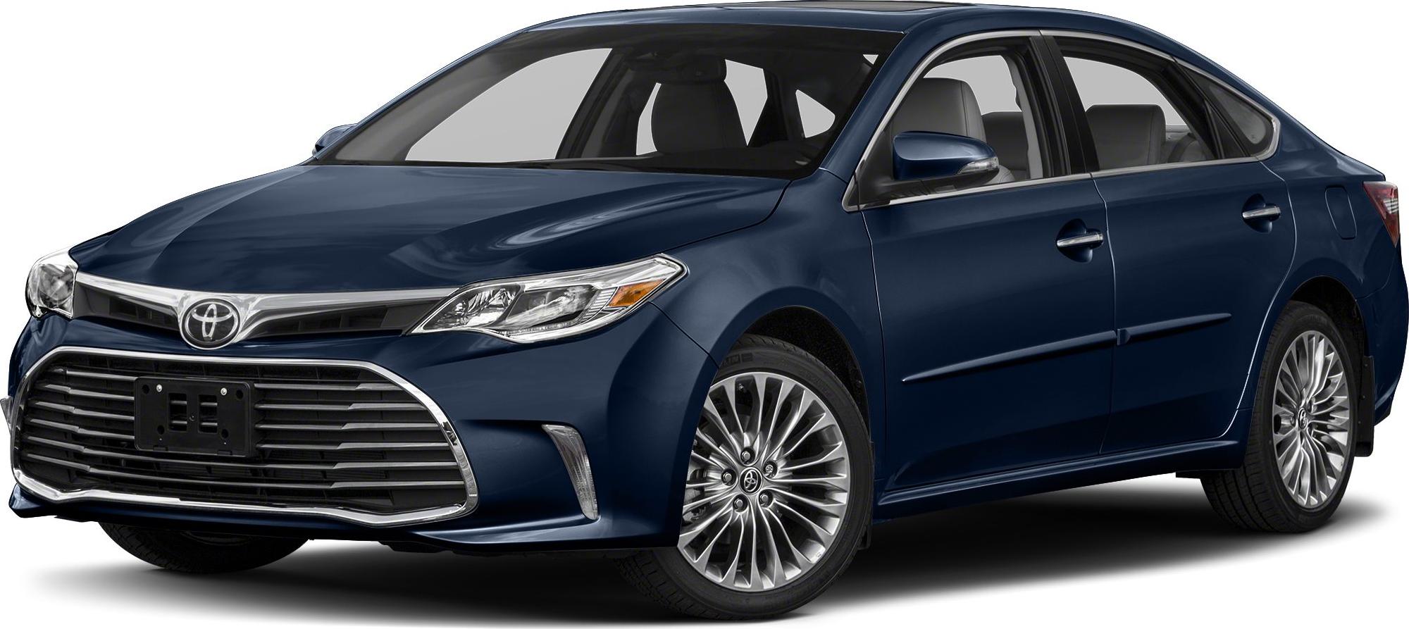 Sedan side-front view with large grille and alloy wheels