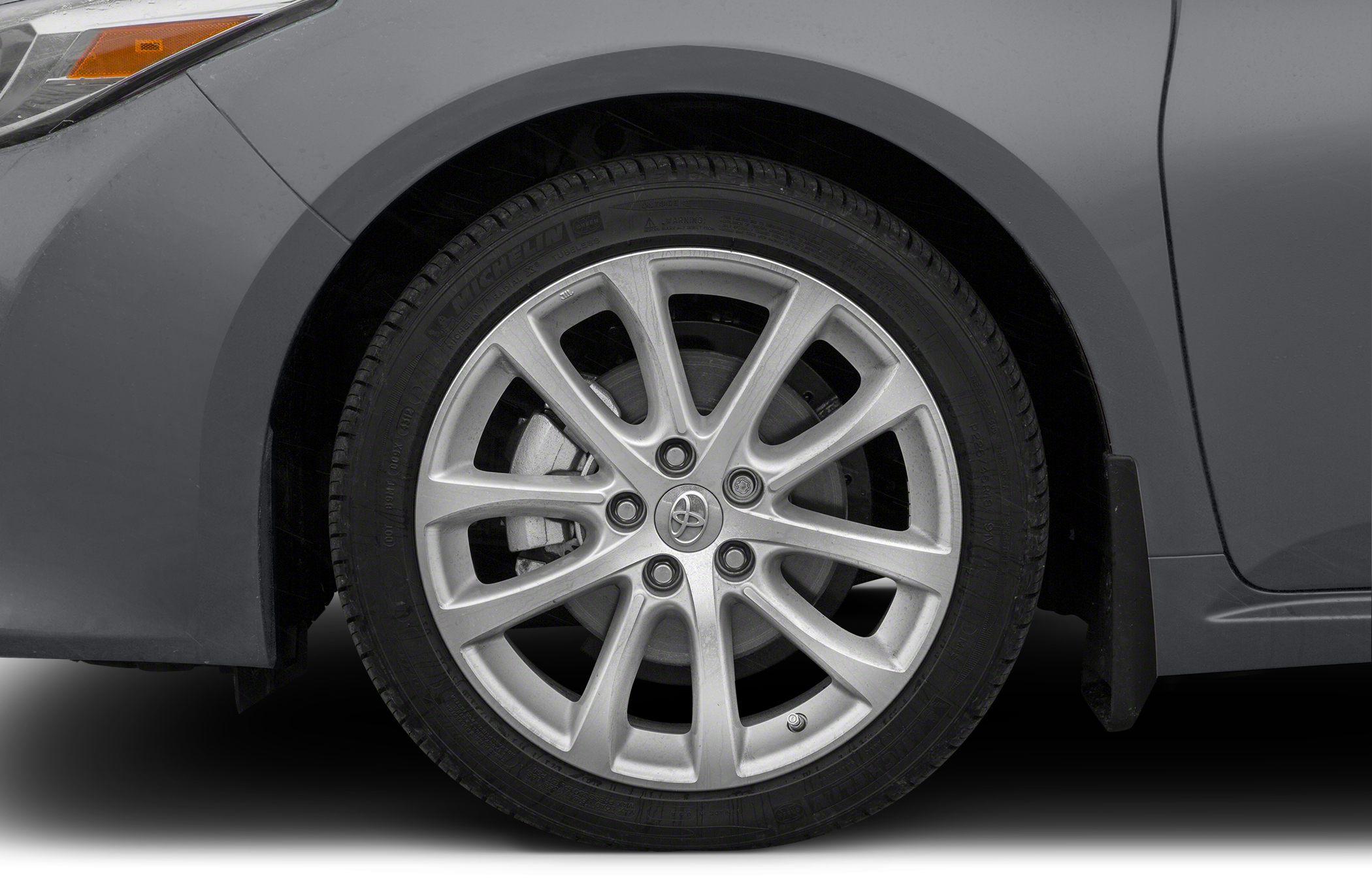Close-up of Toyota wheel with 10-spoke alloy rim and Michelin tire