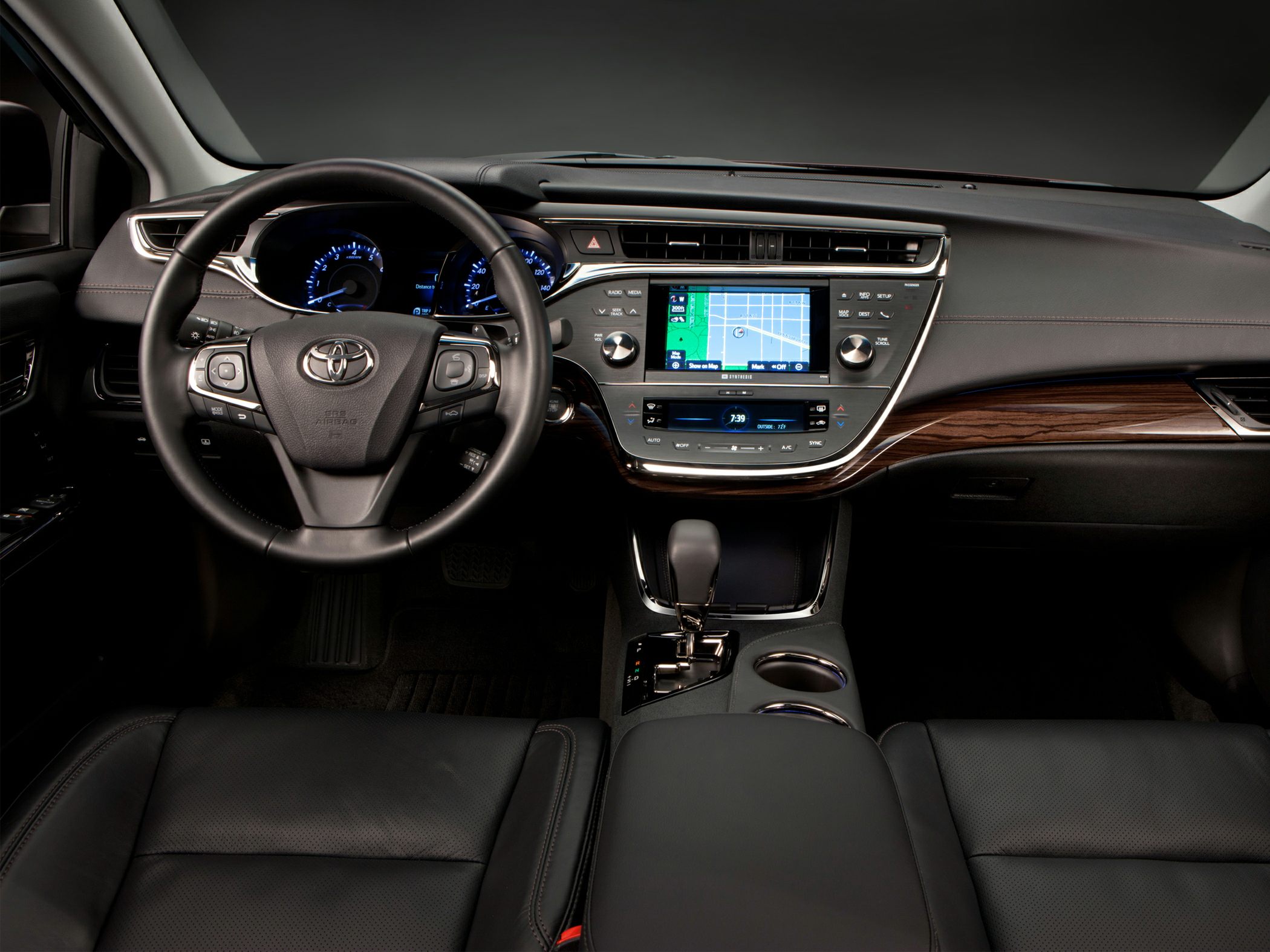 Leather steering wheel and dashboard with navigation and wood trim