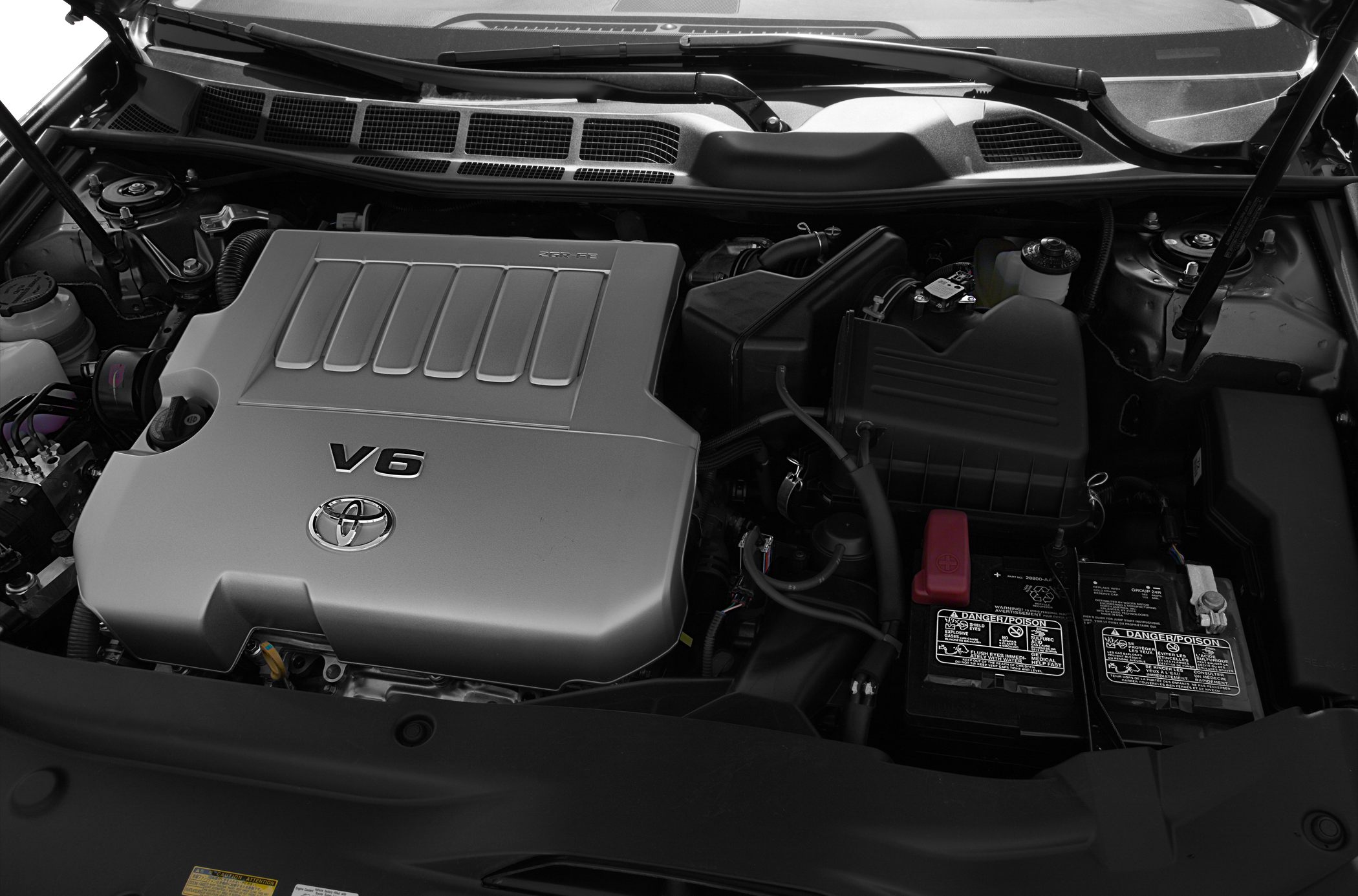V6 engine compartment with battery and air intake components