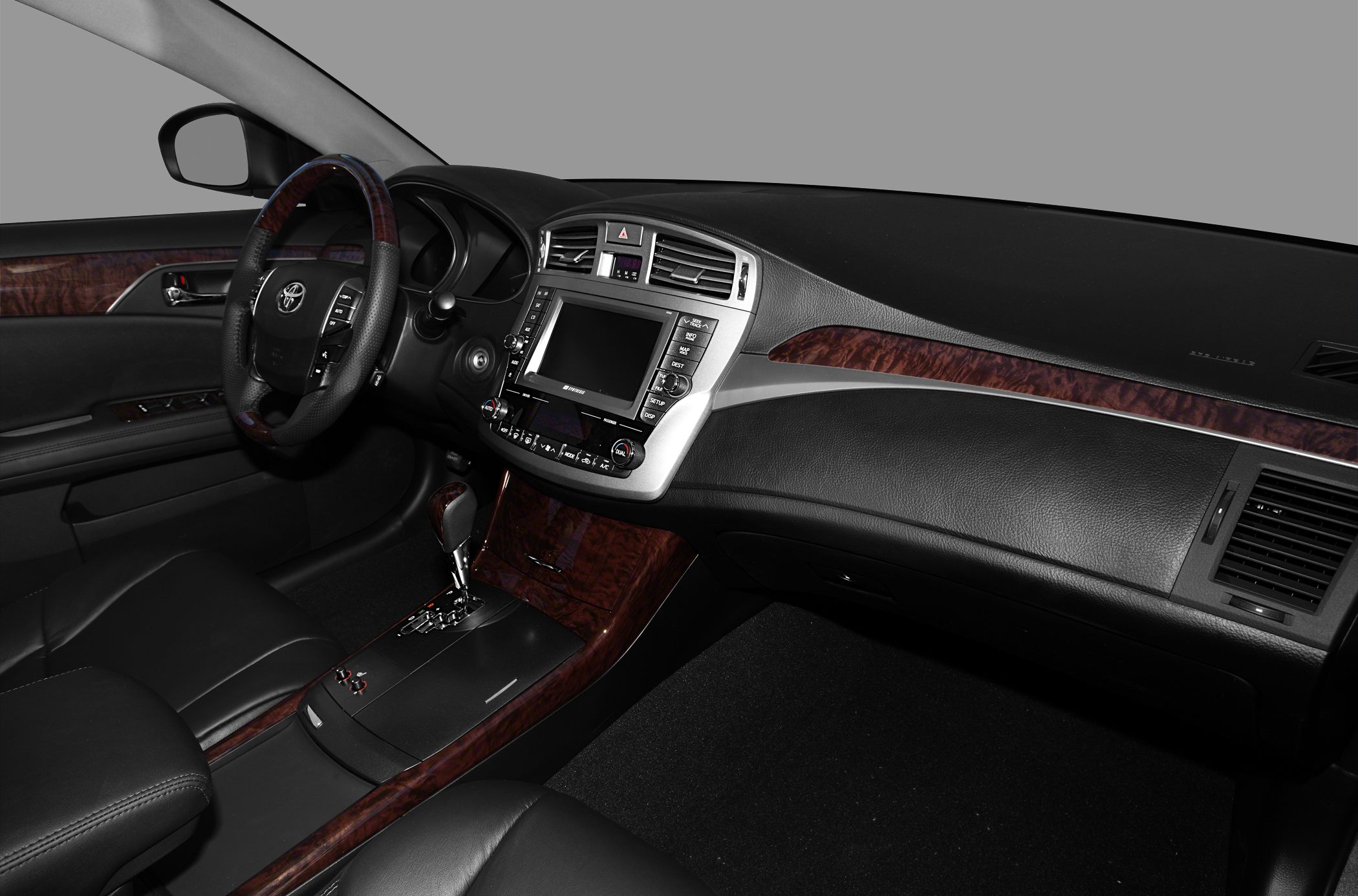 Interior with wood trim, touchscreen infotainment, leather seats
