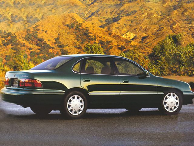 Side view of a sedan with smooth body lines and alloy wheels