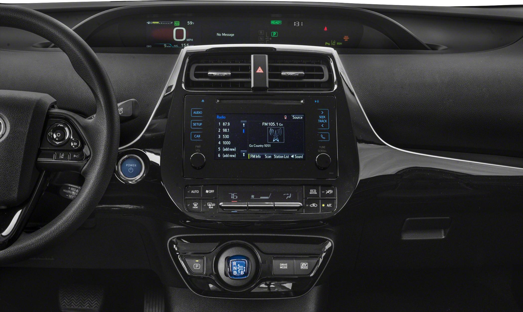 Digital instrument cluster, infotainment system, gear selector, and climate controls