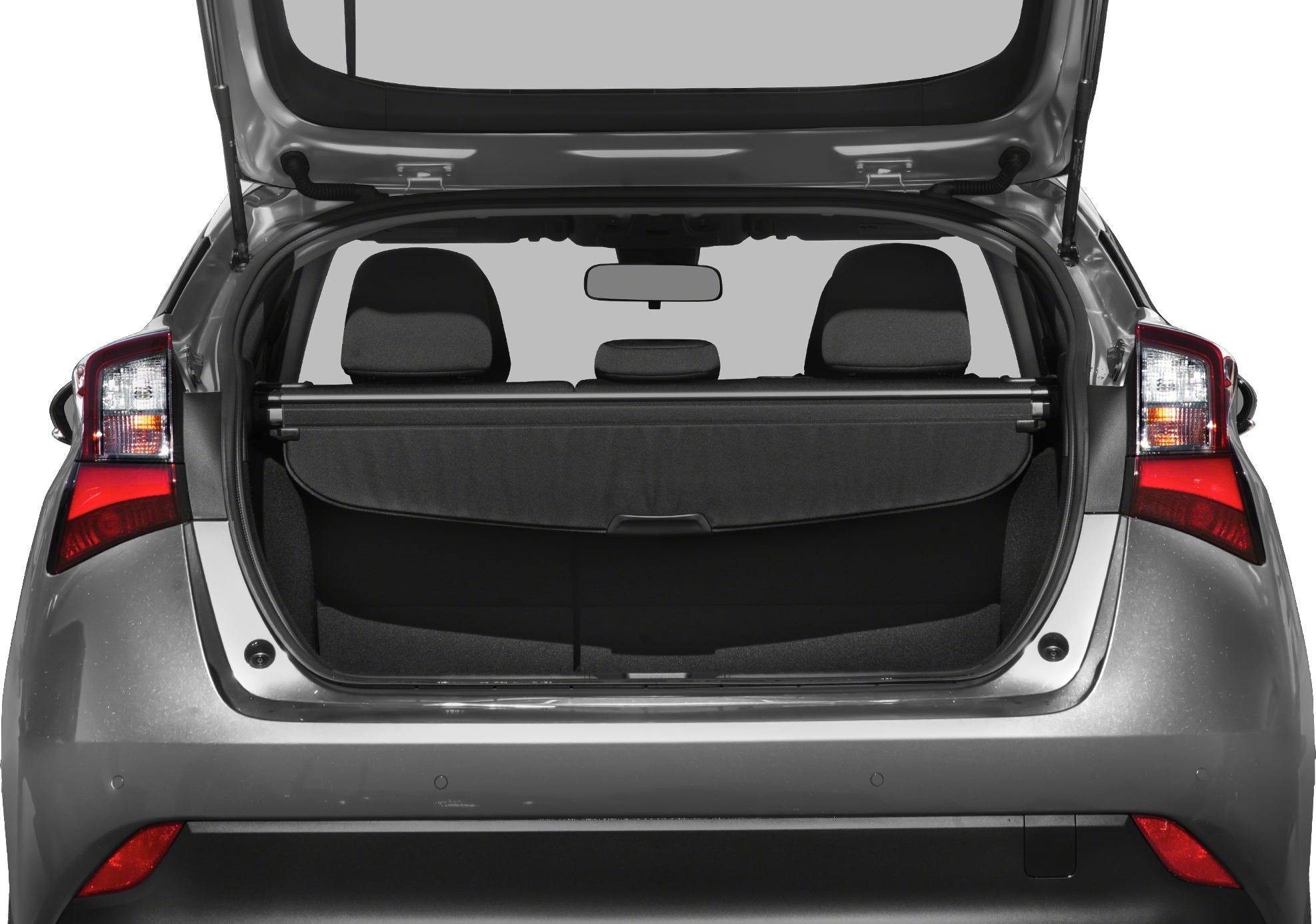 Open rear hatch showing cargo space and rear seats with privacy cover.