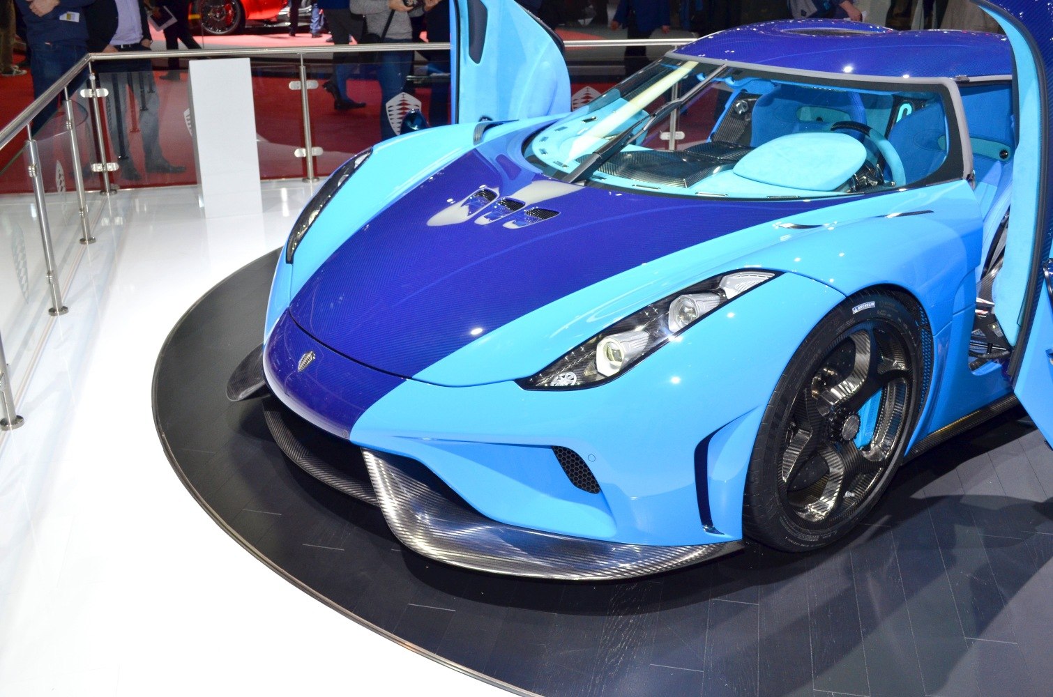 Front view with butterfly doors and carbon fiber splitter