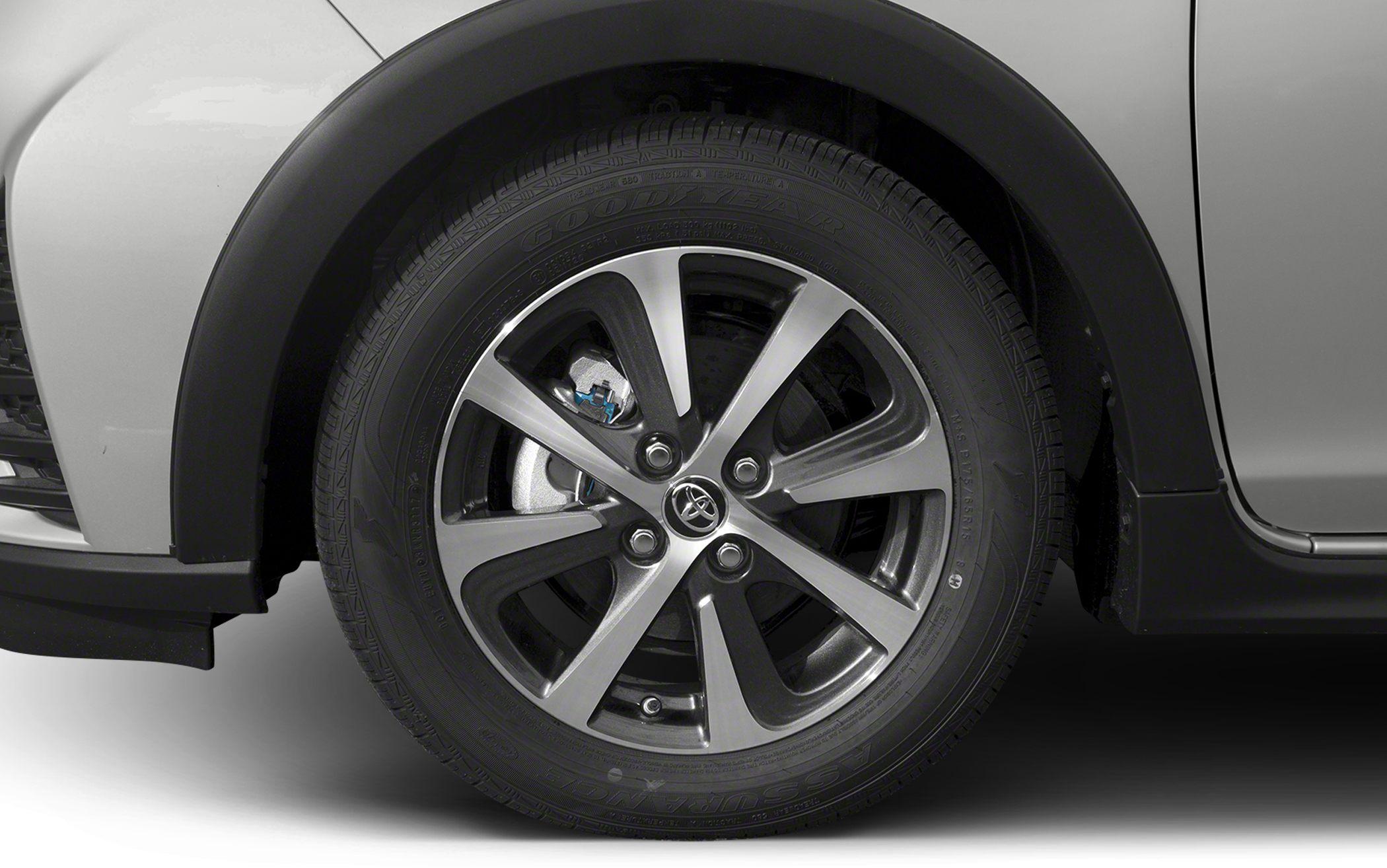 Close-up of alloy wheel and tire with visible brake caliper