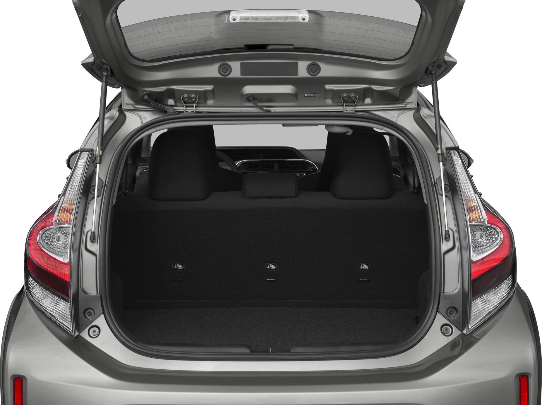 Open rear hatch with visible cargo area and rear seatbacks in compact hatchback
