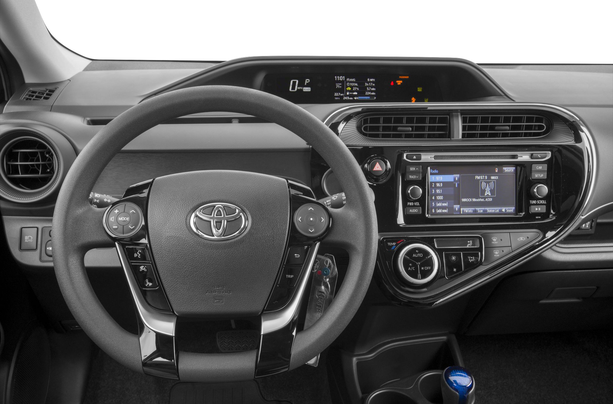 Dashboard with digital display and multifunction steering wheel.