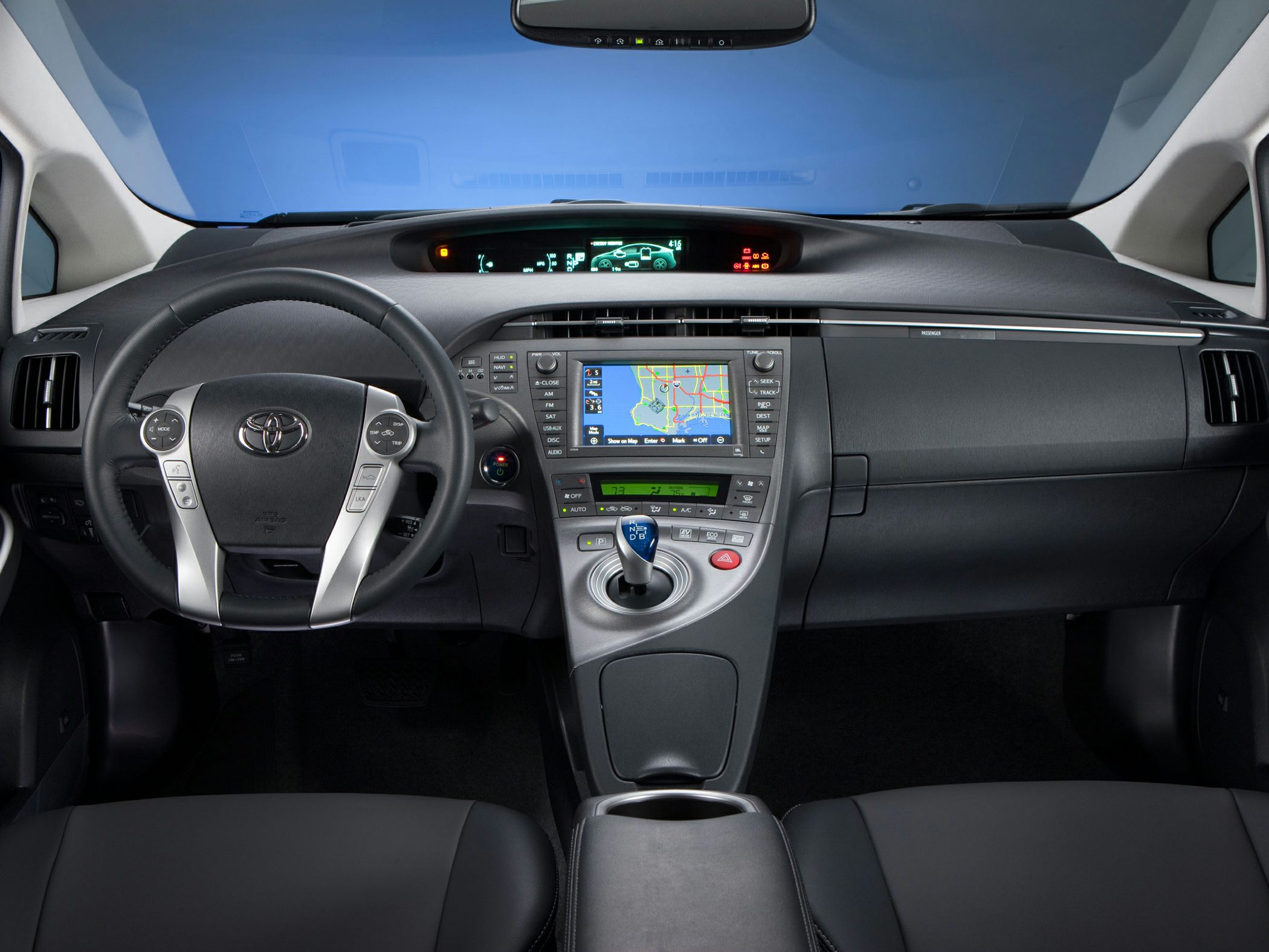 Dashboard with digital instrument cluster and steering wheel with controls