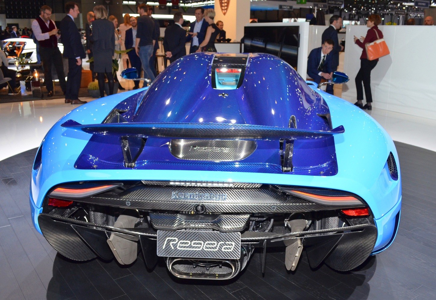 Rear view with carbon fiber spoiler, aerodynamic diffuser, and central exhaust