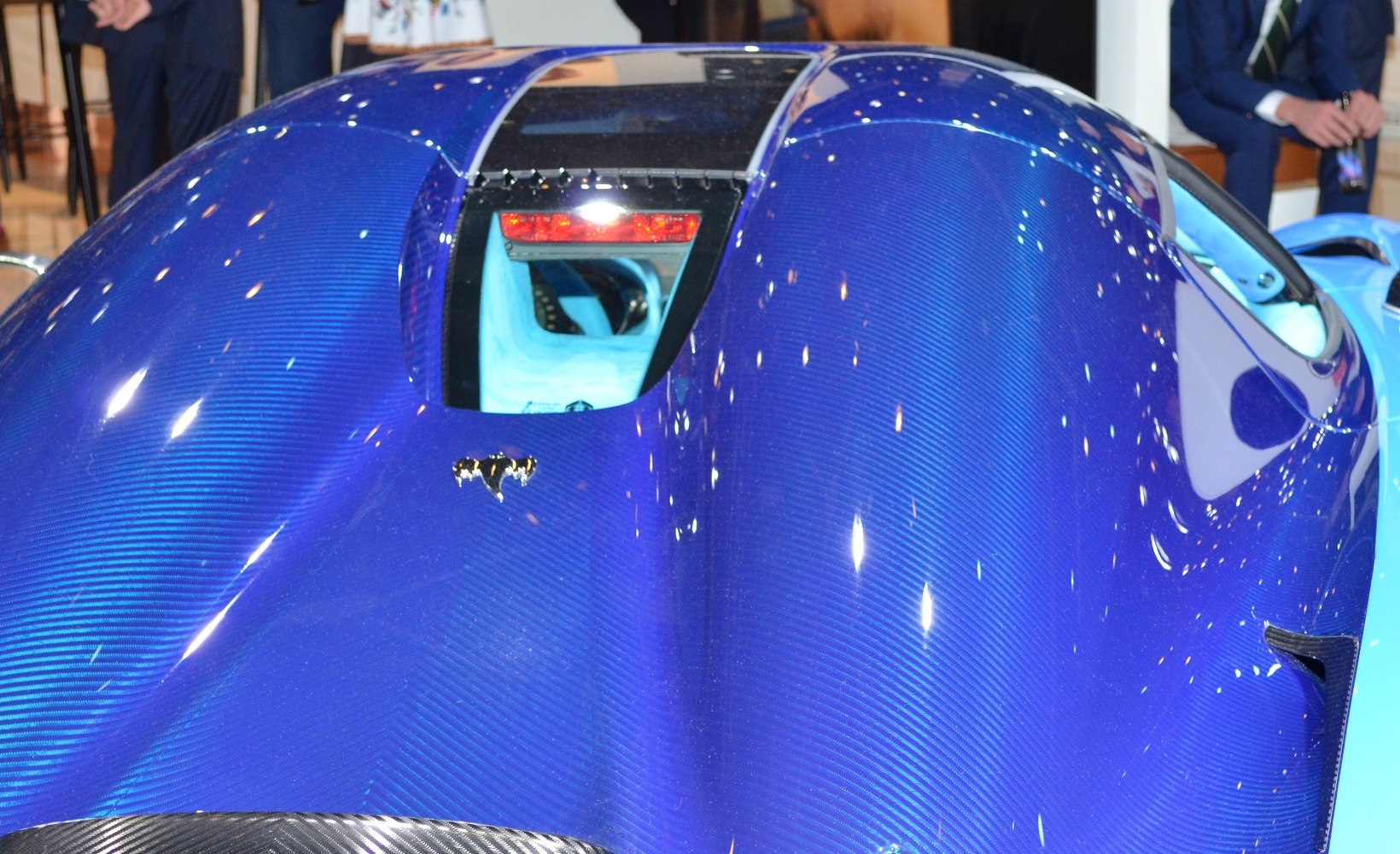 Blue carbon fiber rear hood with exposed engine window