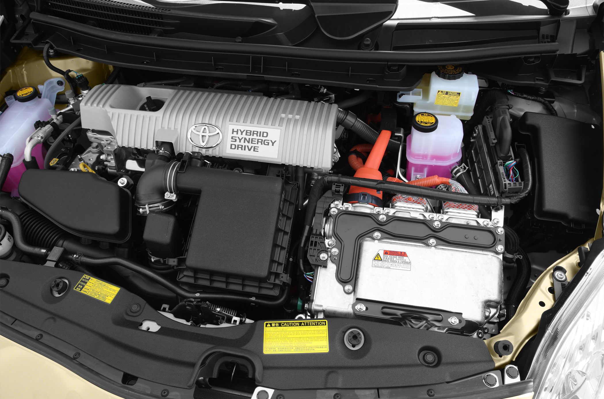 Hybrid Synergy Drive engine bay with electric and combustion components