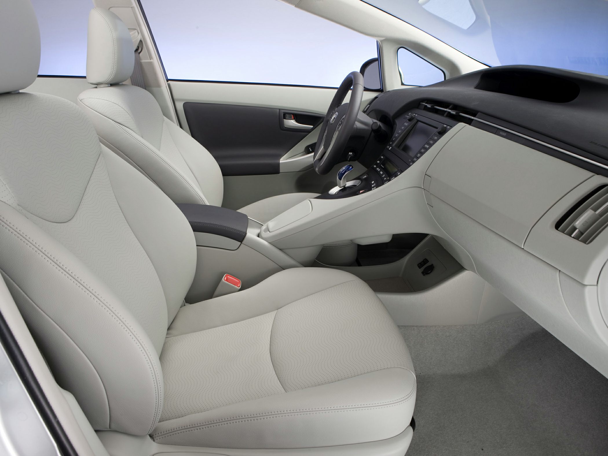 Light upholstery front seats with modern dashboard and center console
