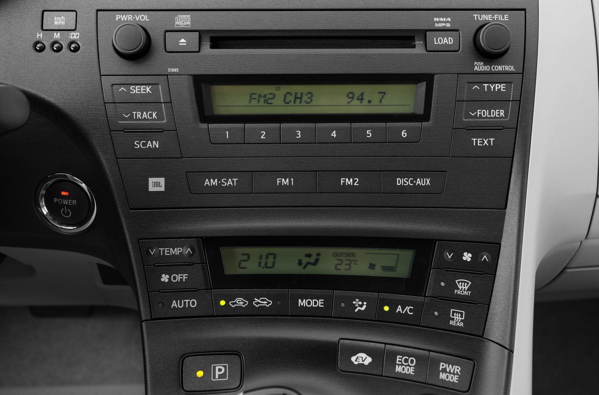 Dashboard audio system and climate control panel with digital displays and buttons.