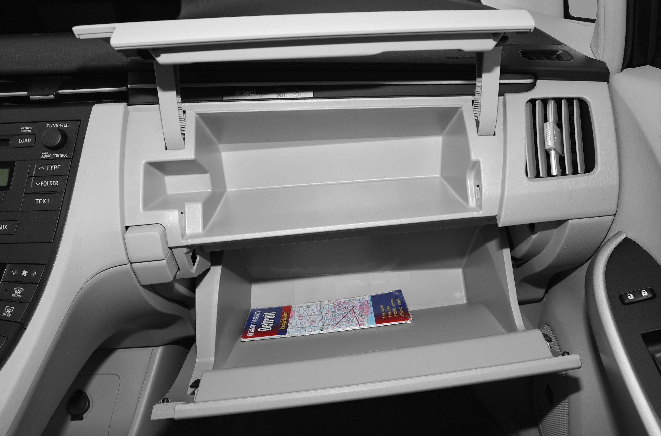 Dual-level glove compartment with storage space in car interior