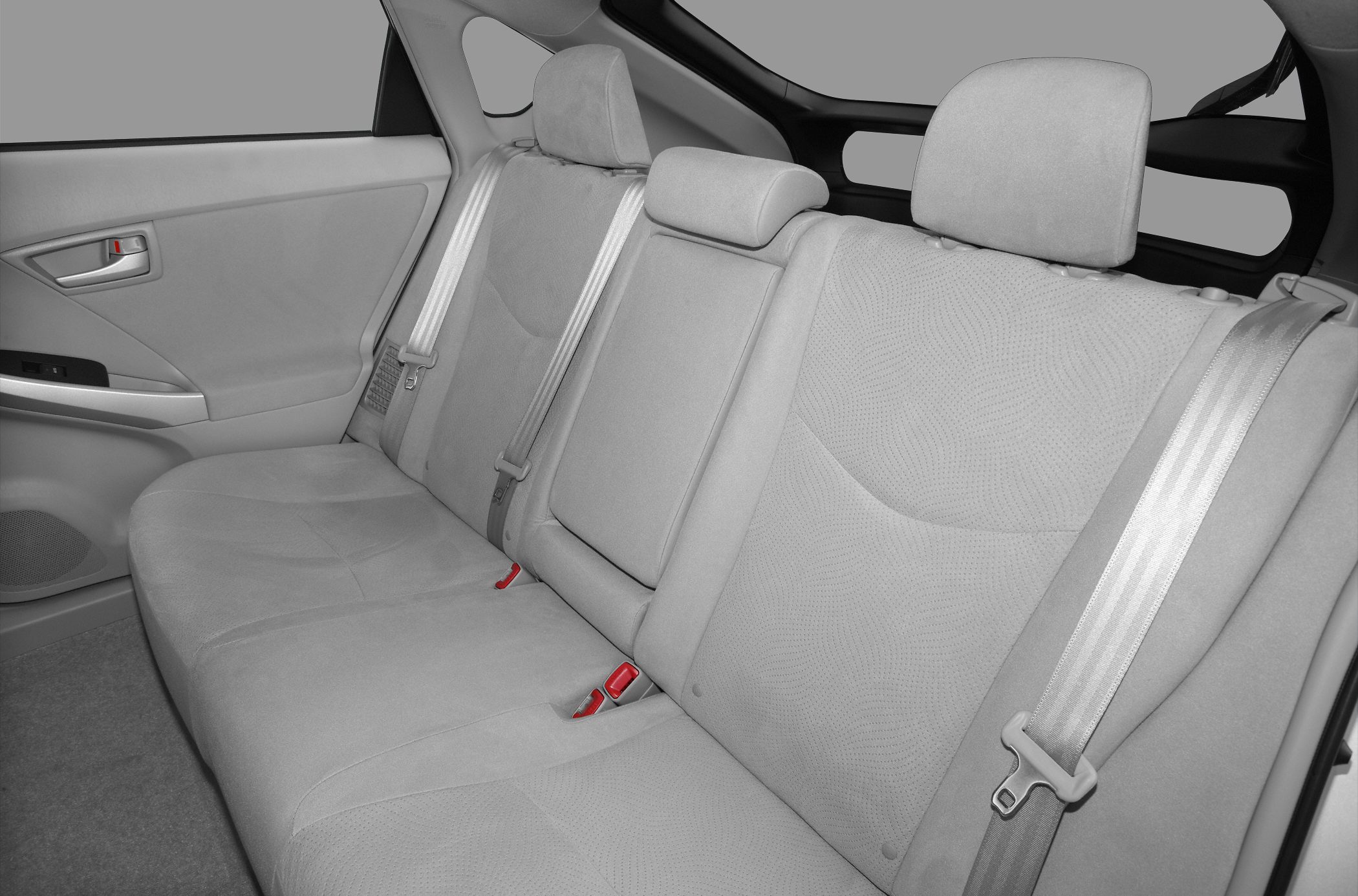 Rear seat interior with seat belts and headrests