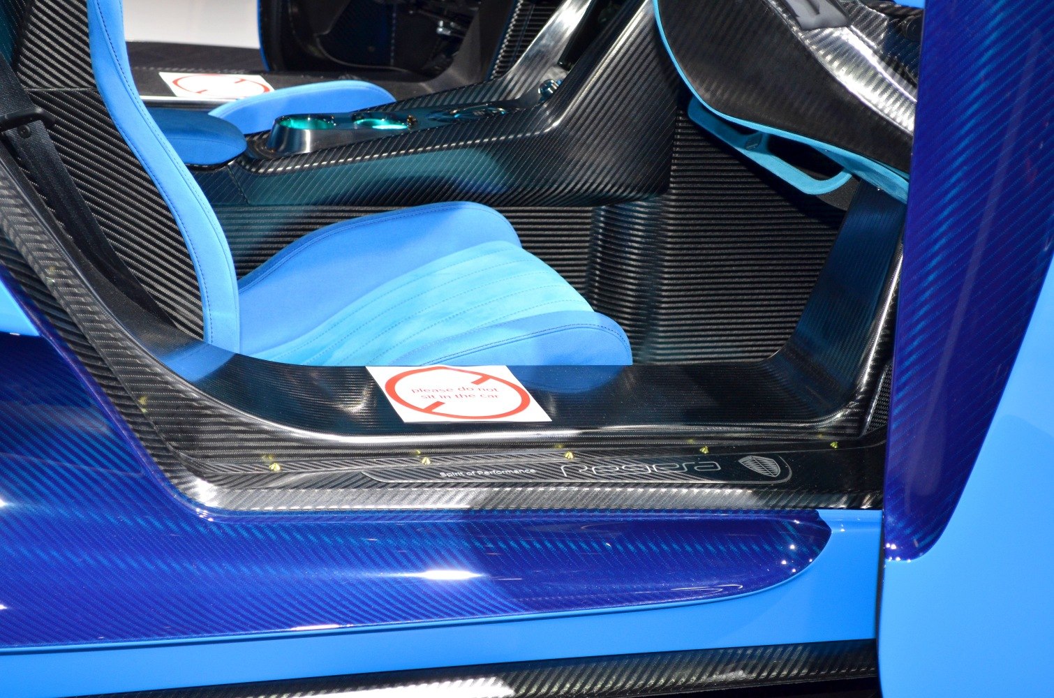 Carbon fiber interior trim with blue seats