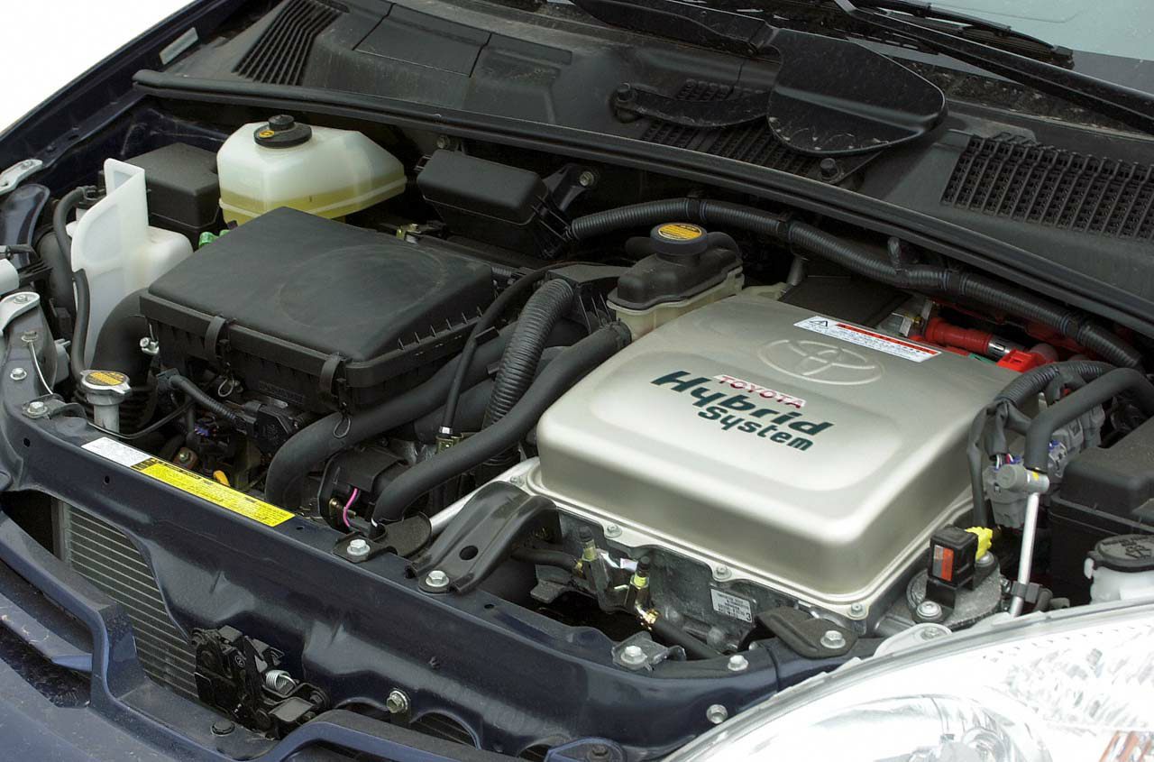 Hybrid system engine bay with visible components under hood