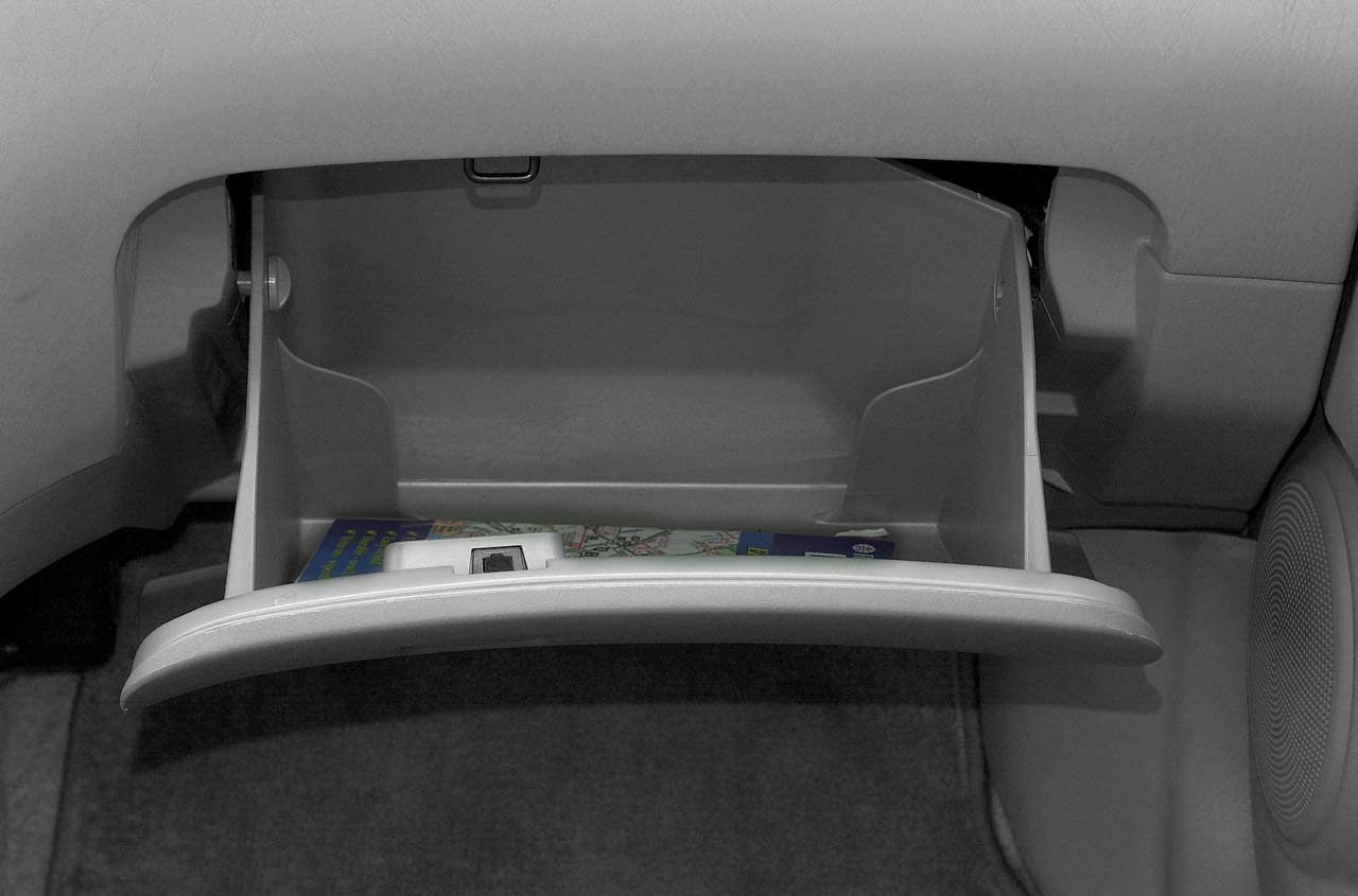 Open glove compartment with dashboard interior and storage space