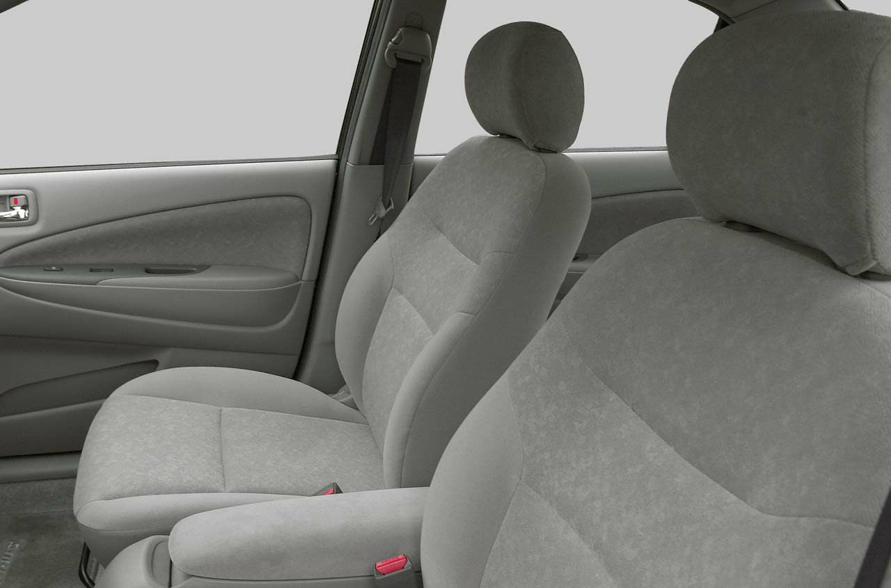 Gray cloth front seats with armrest and door panel