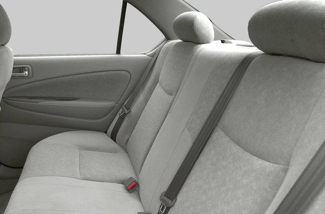 Rear seat upholstery and door interior with seat belts