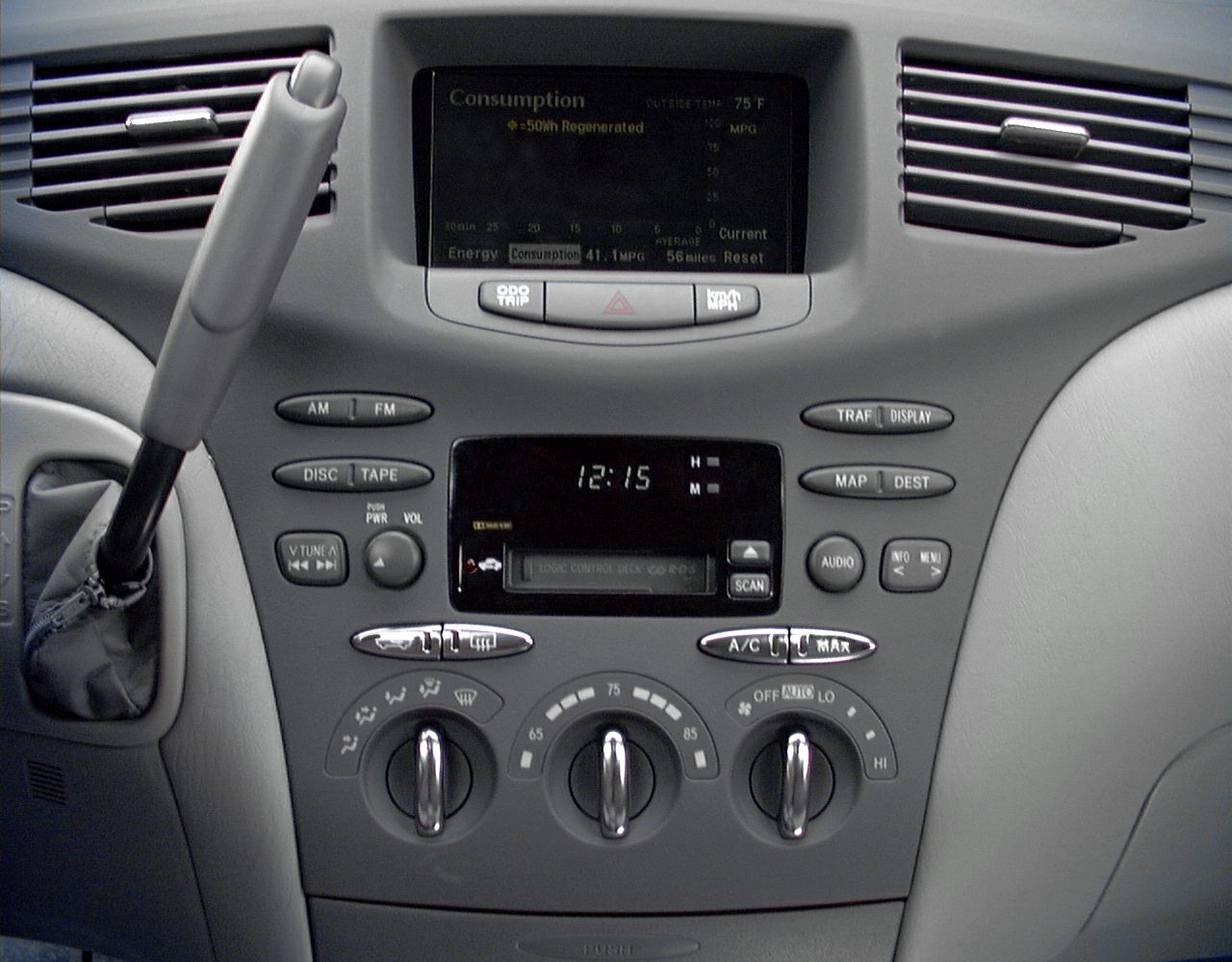 Digital fuel consumption screen and analog climate control dials