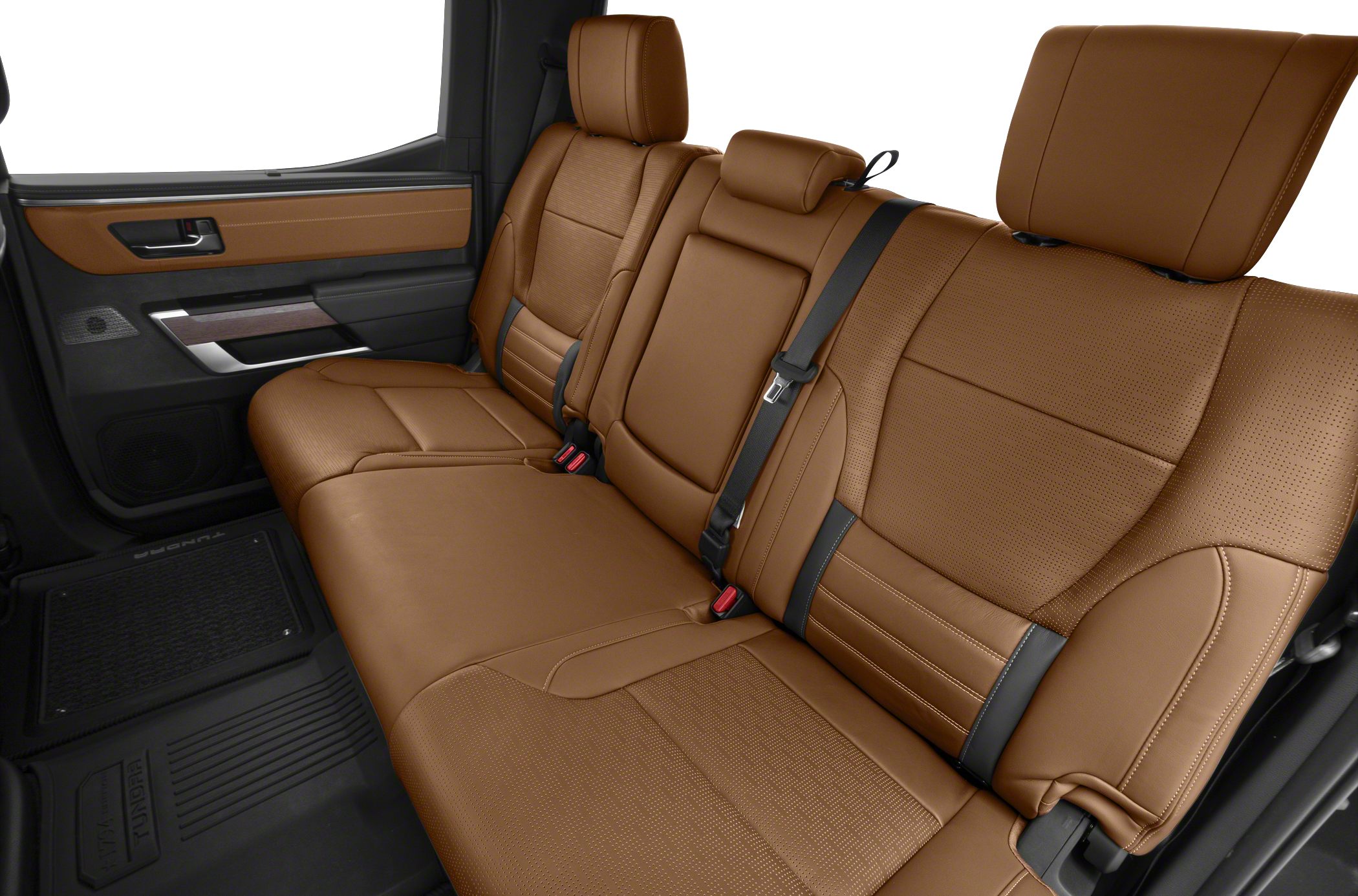 Brown leather rear seats with headrests and seatbelt in spacious truck cabin