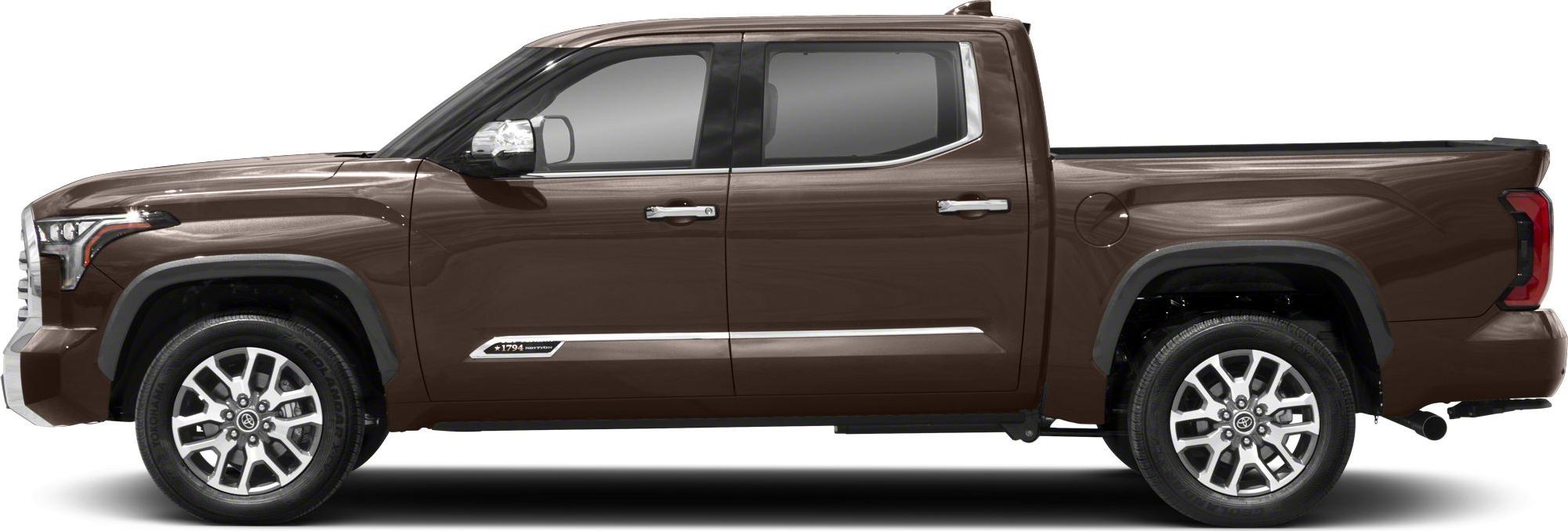 Side profile of a crew cab pickup with short bed and alloy wheels