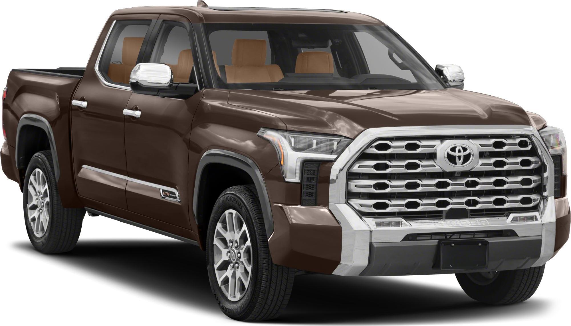 Full-size pickup with CrewMax cab, short bed, and prominent chrome grille.