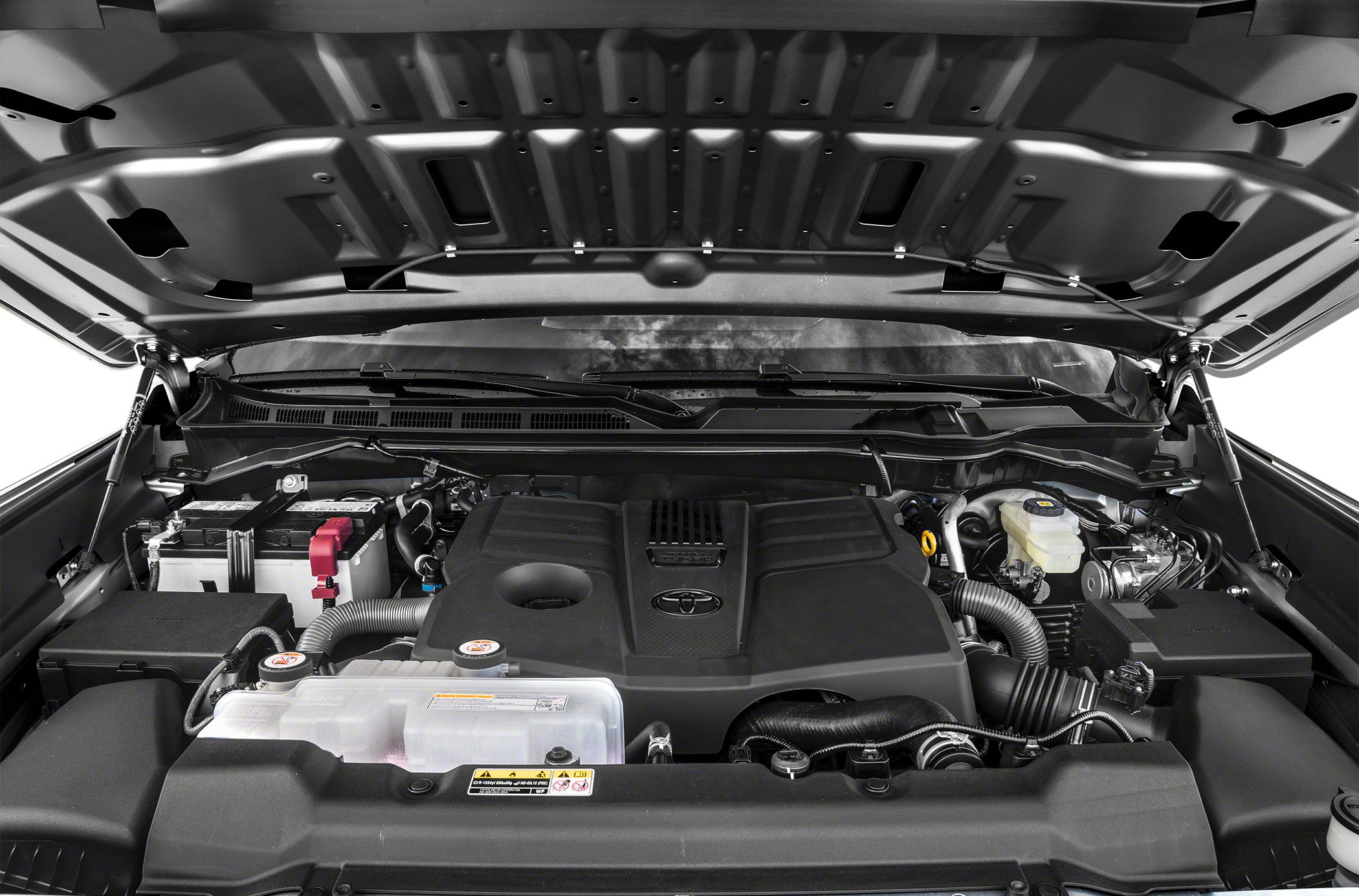 Engine compartment of modern truck with prominent engine cover