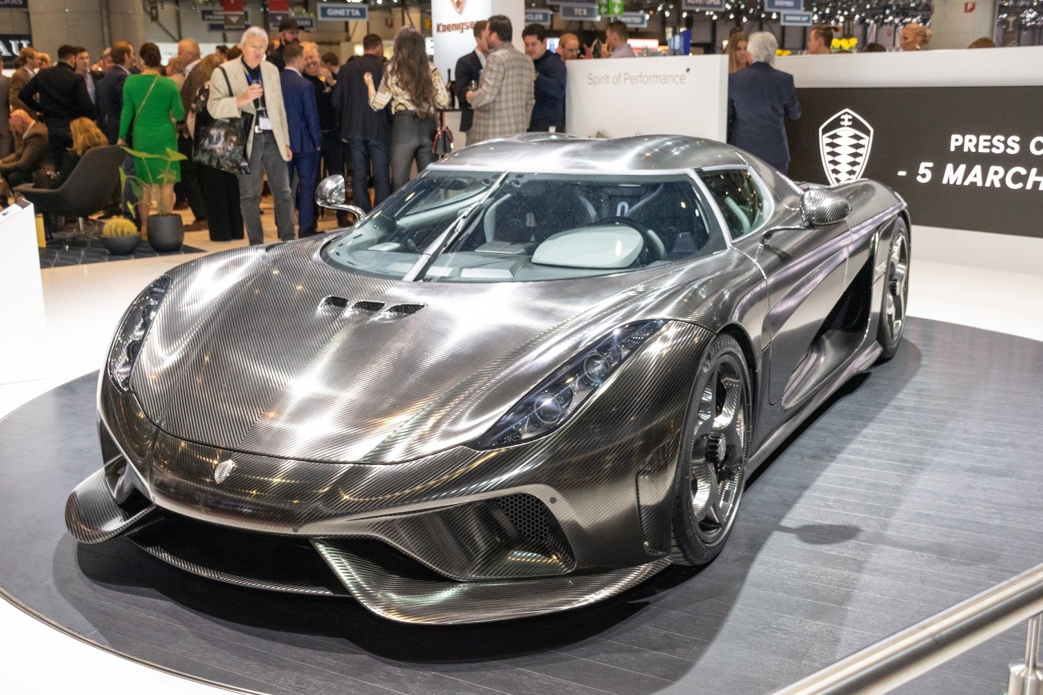 Exposed carbon fiber body and aerodynamic front splitter of a hypercar