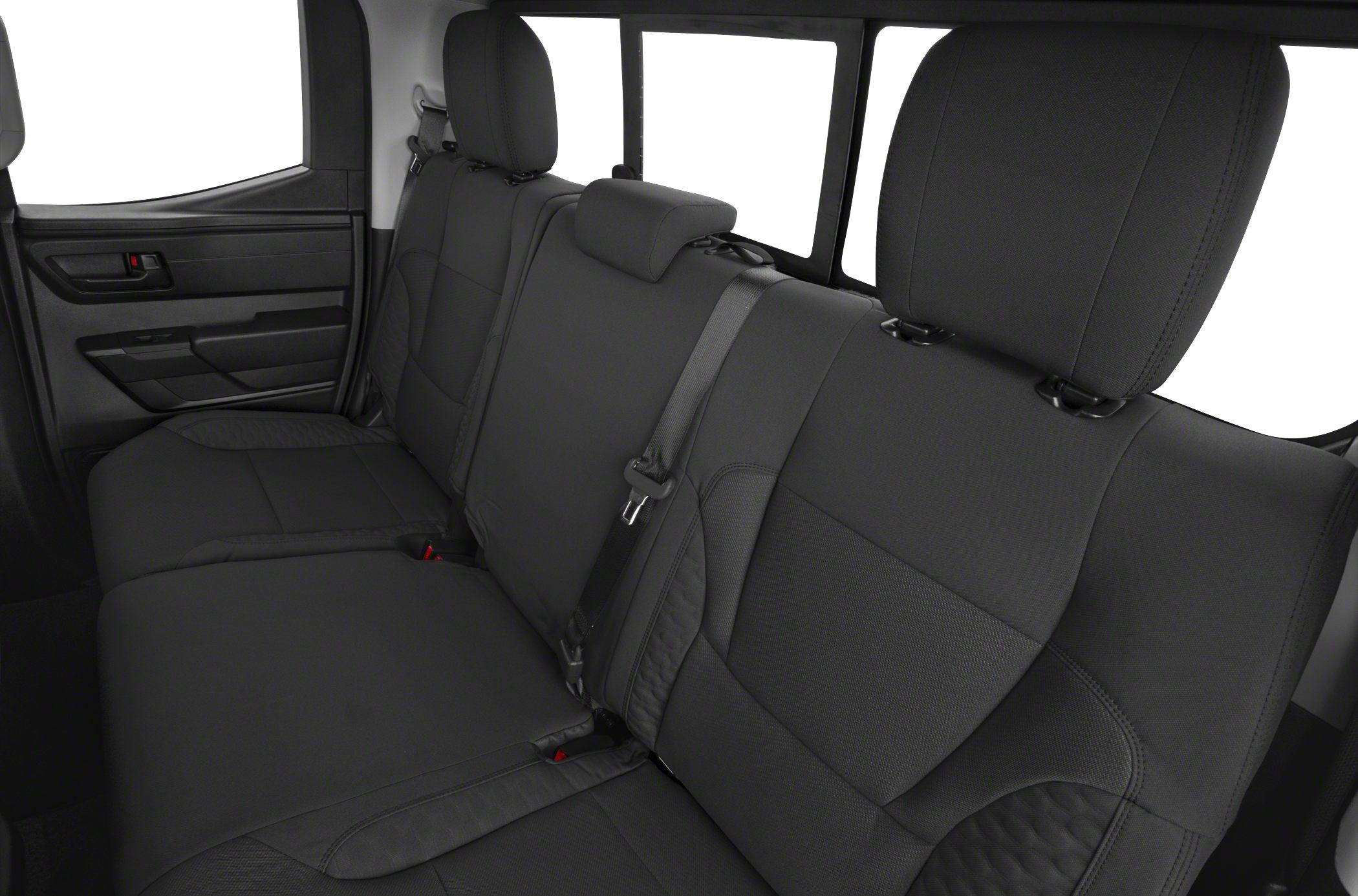 Spacious rear double cab seats with black upholstery and seatbelts