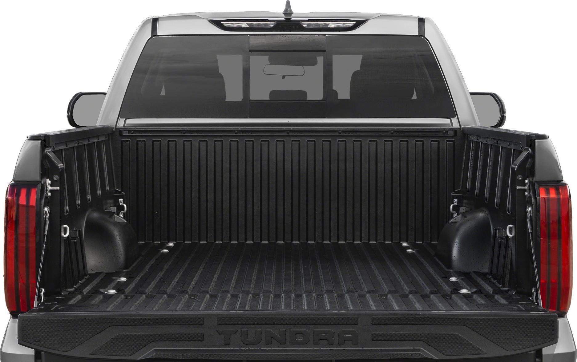 Rear view of pickup truck bed with protective liner and tailgate