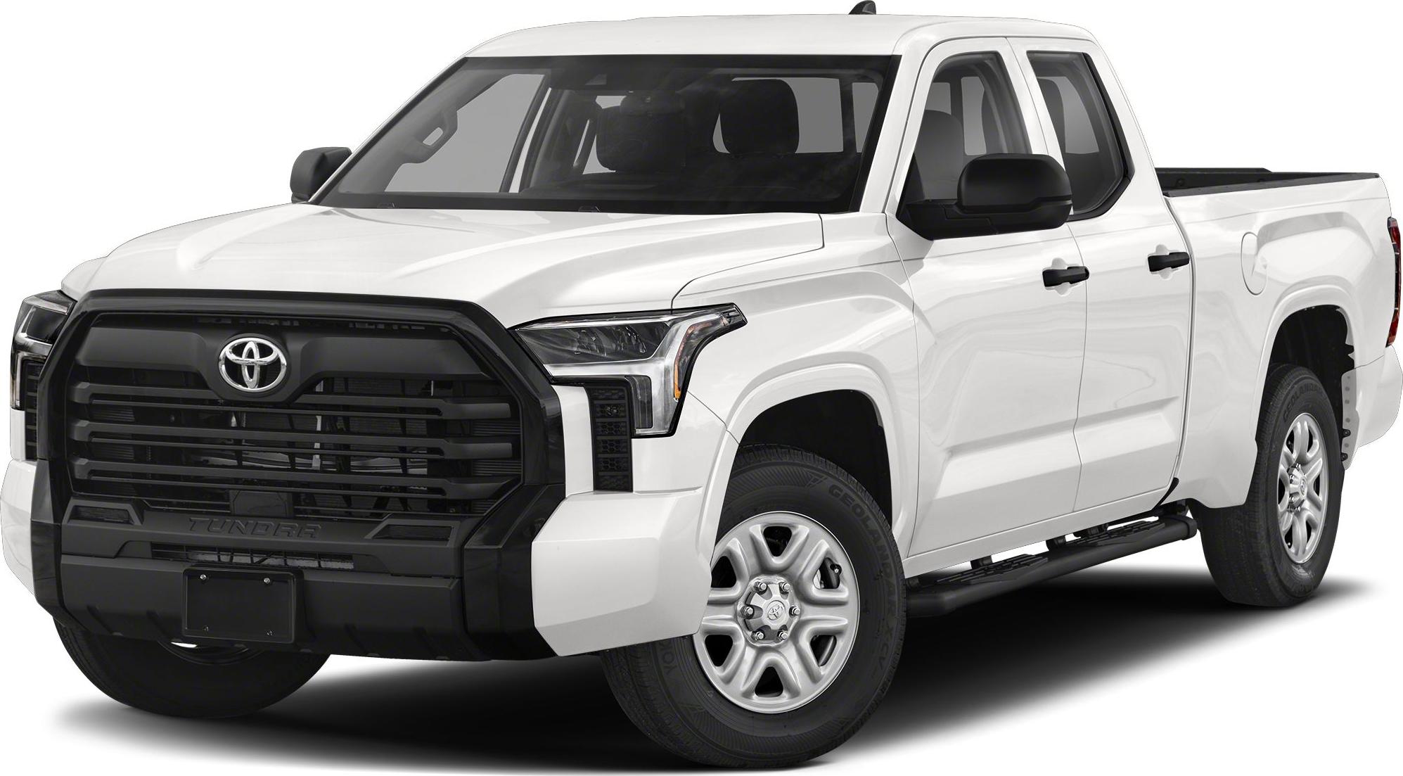 Large black front grille and double cab with standard bed.