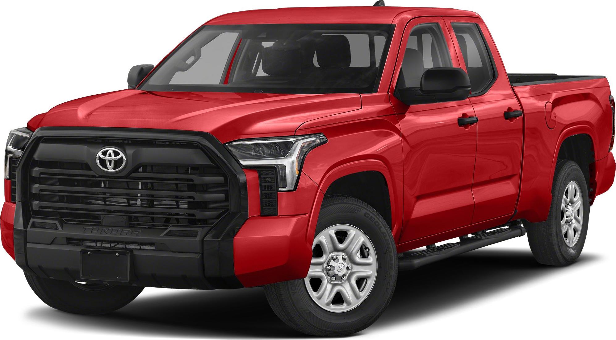 Red pickup with dual cab, standard bed, black grille, and silver wheels.